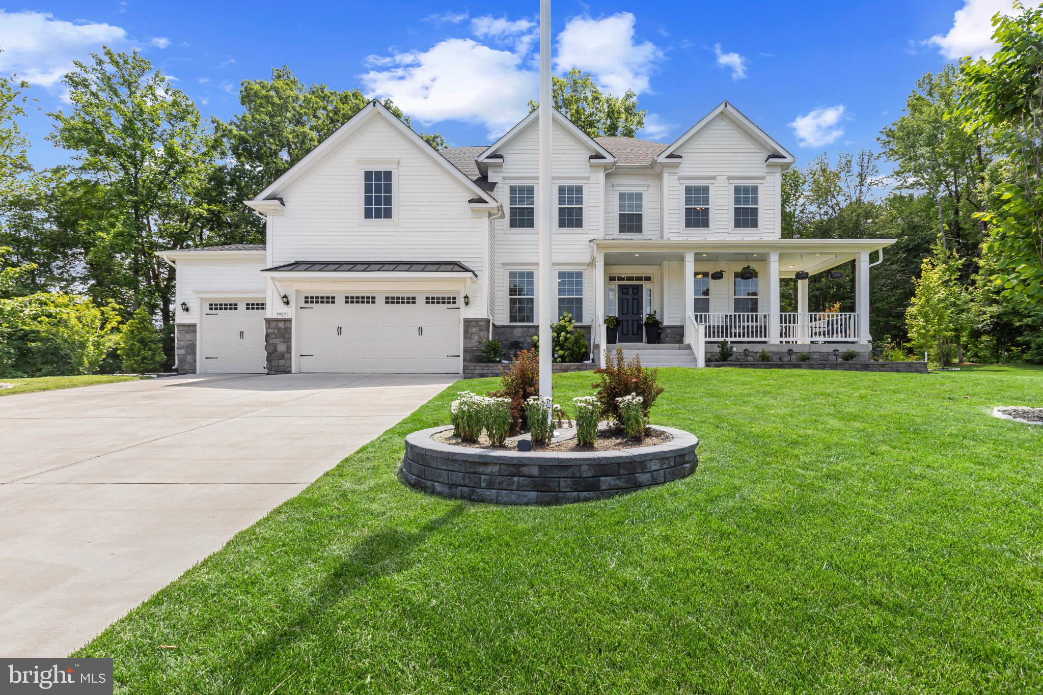 9909 Kildore Way Fort Washington, MD 20744 - Photo 1 of 43 a front view of house with a garden