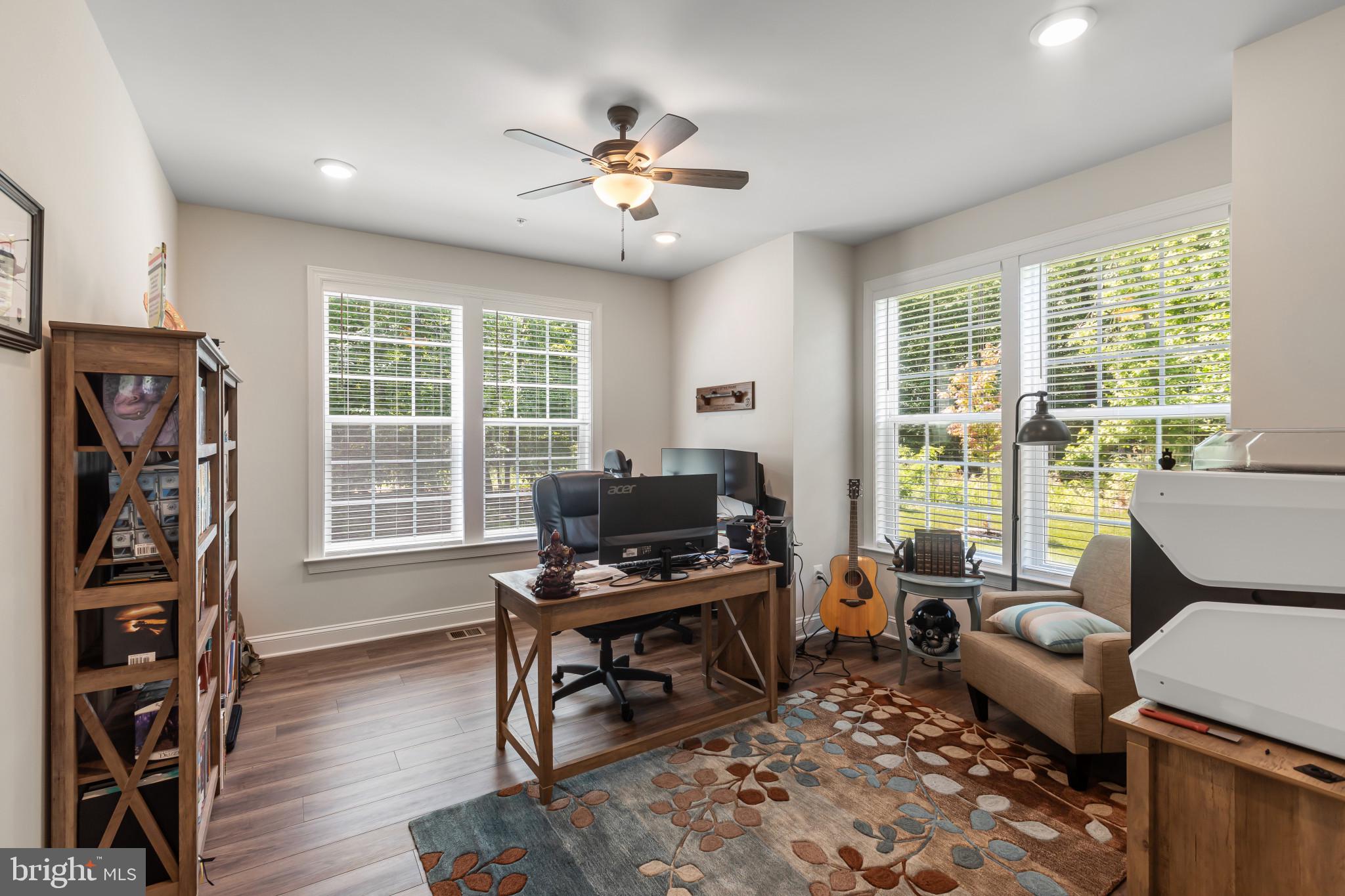9909 Kildore Way Fort Washington, MD 20744 - Photo 15 of 43 a view of a workspace with furniture and a window