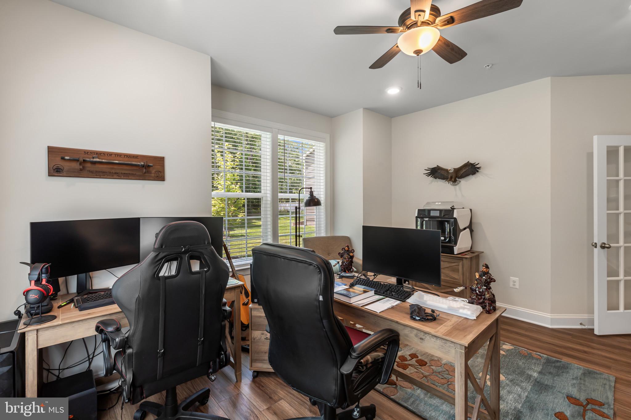 9909 Kildore Way Fort Washington, MD 20744 - Photo 16 of 43 a view of a workspace with furniture and a window