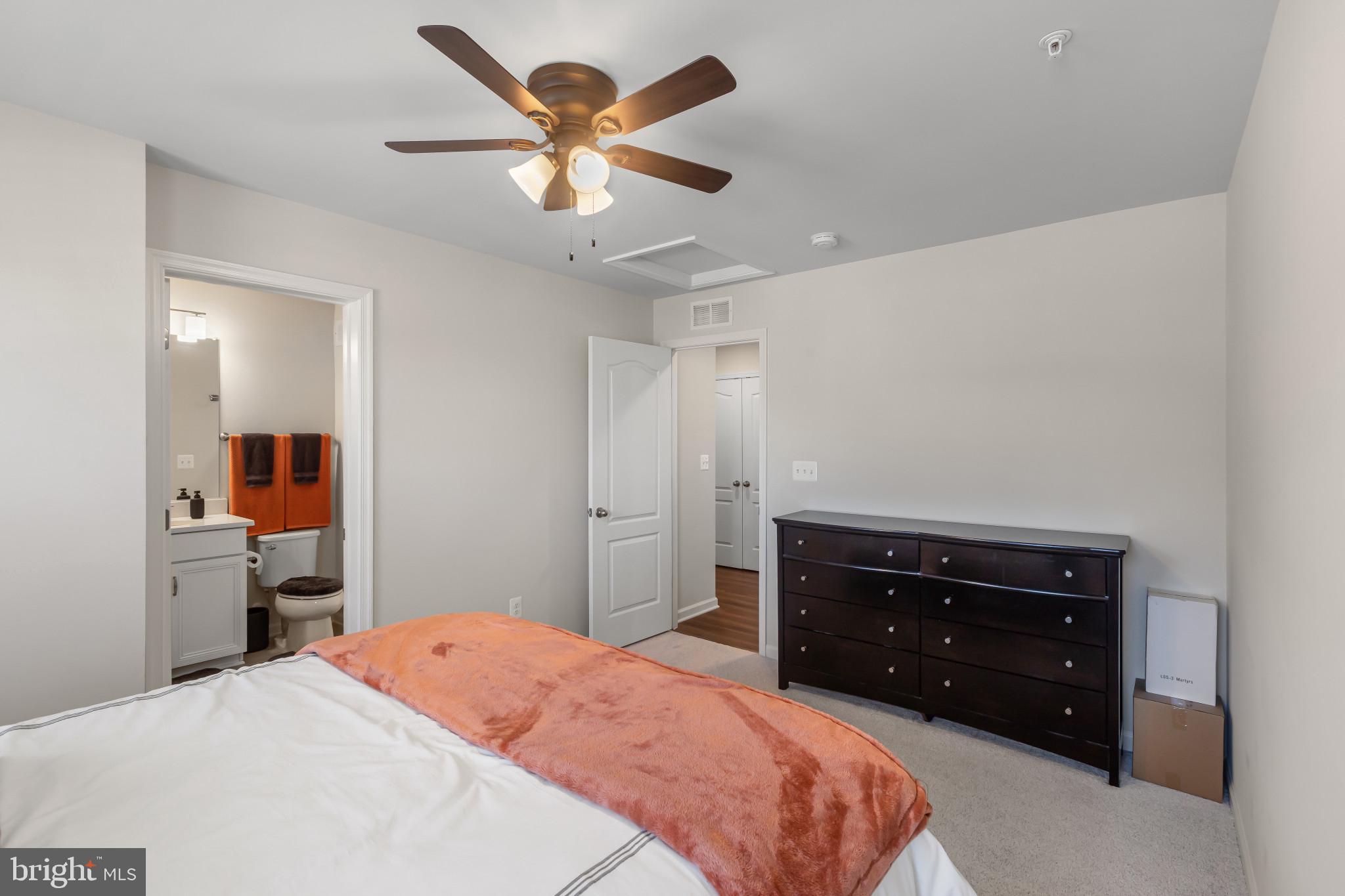 9909 Kildore Way Fort Washington, MD 20744 - Photo 20 of 43 a bedroom with a bed and a dresser