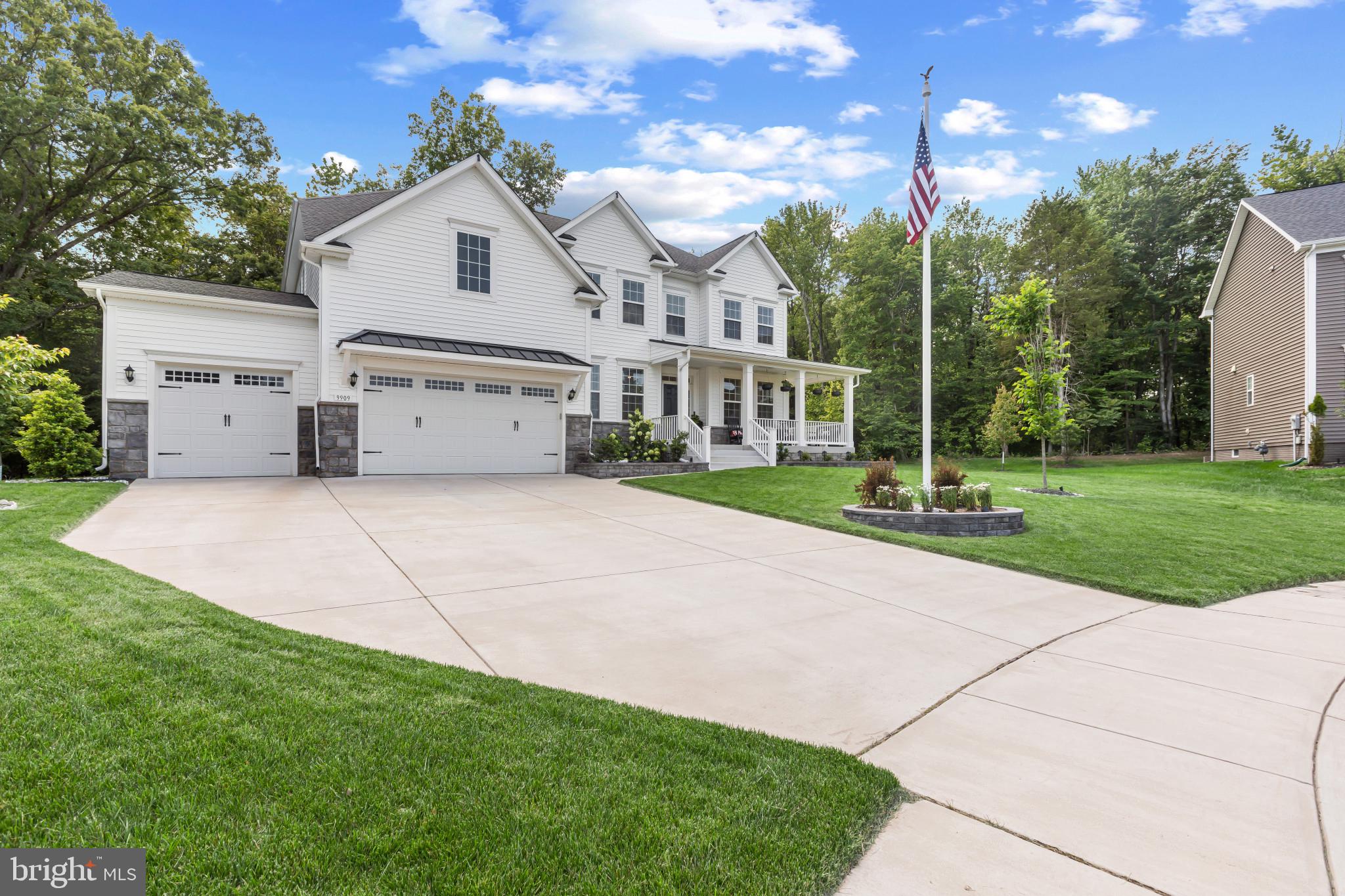 9909 Kildore Way Fort Washington, MD 20744 - Photo 2 of 43 a view of a house with a yard and potted plants