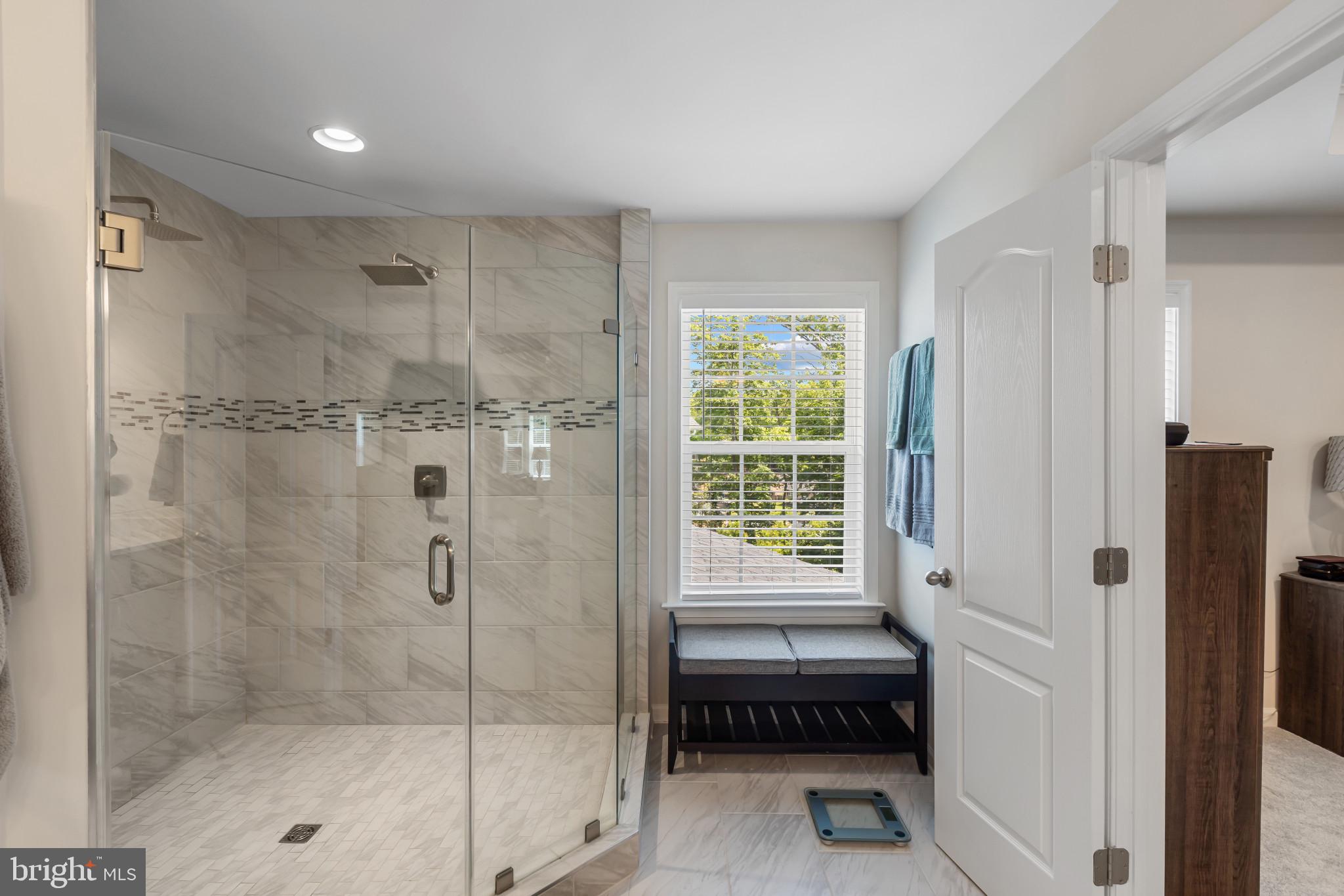9909 Kildore Way Fort Washington, MD 20744 - Photo 23 of 43 a bathroom with a shower and a bath tub