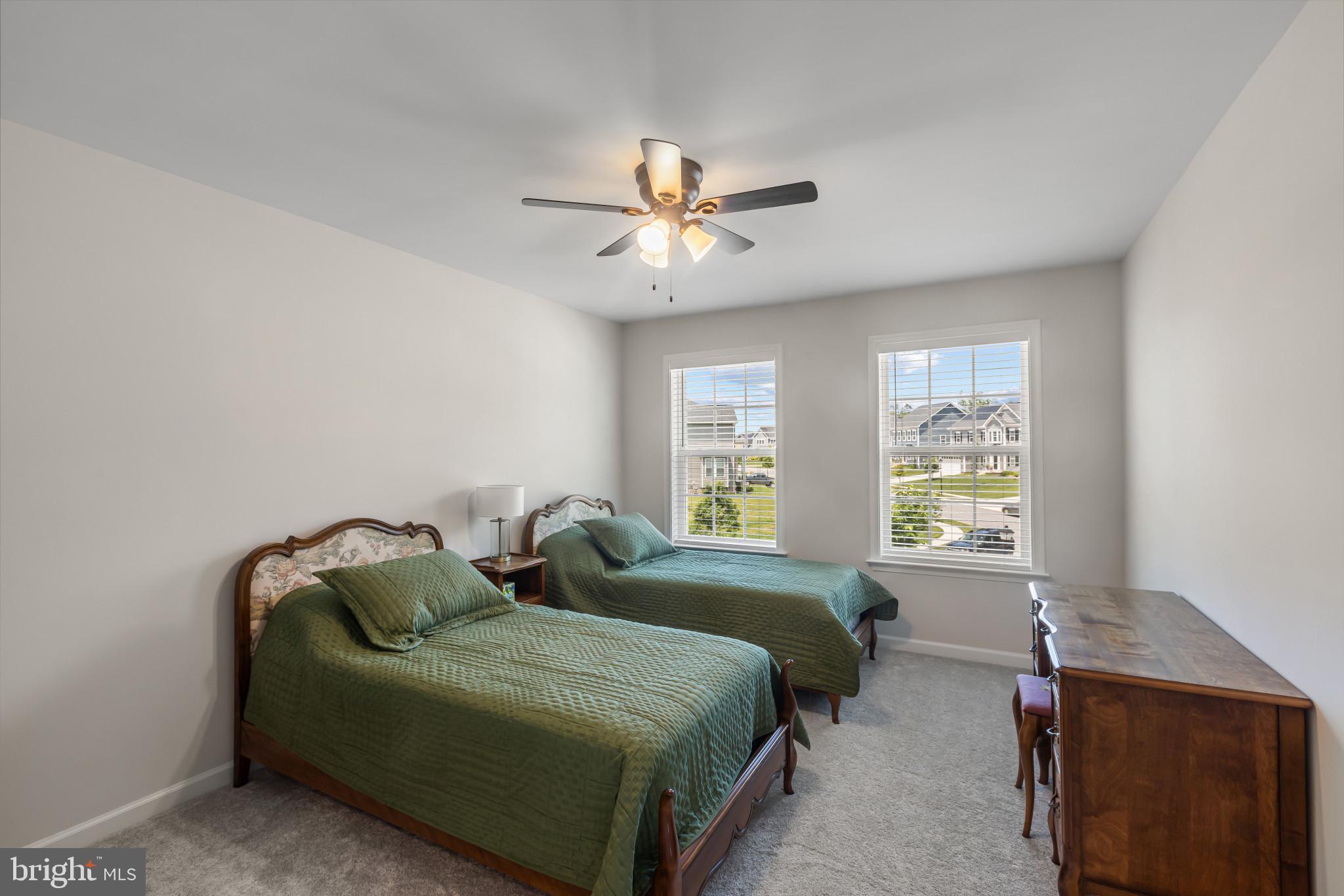 9909 Kildore Way Fort Washington, MD 20744 - Photo 30 of 43 a bedroom with a bed and window