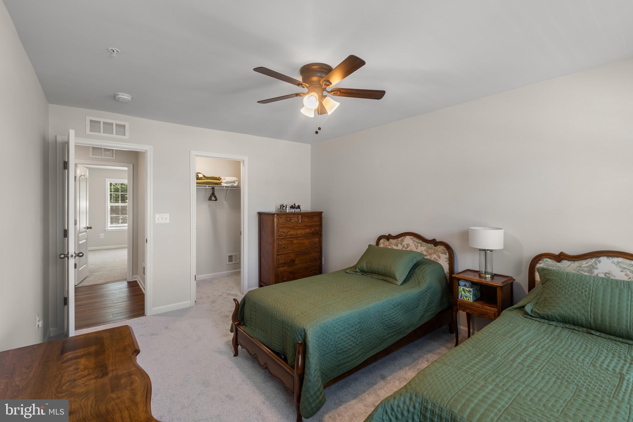 9909 Kildore Way Fort Washington, MD 20744 - Photo 31 of 43 a bedroom with a bed and window