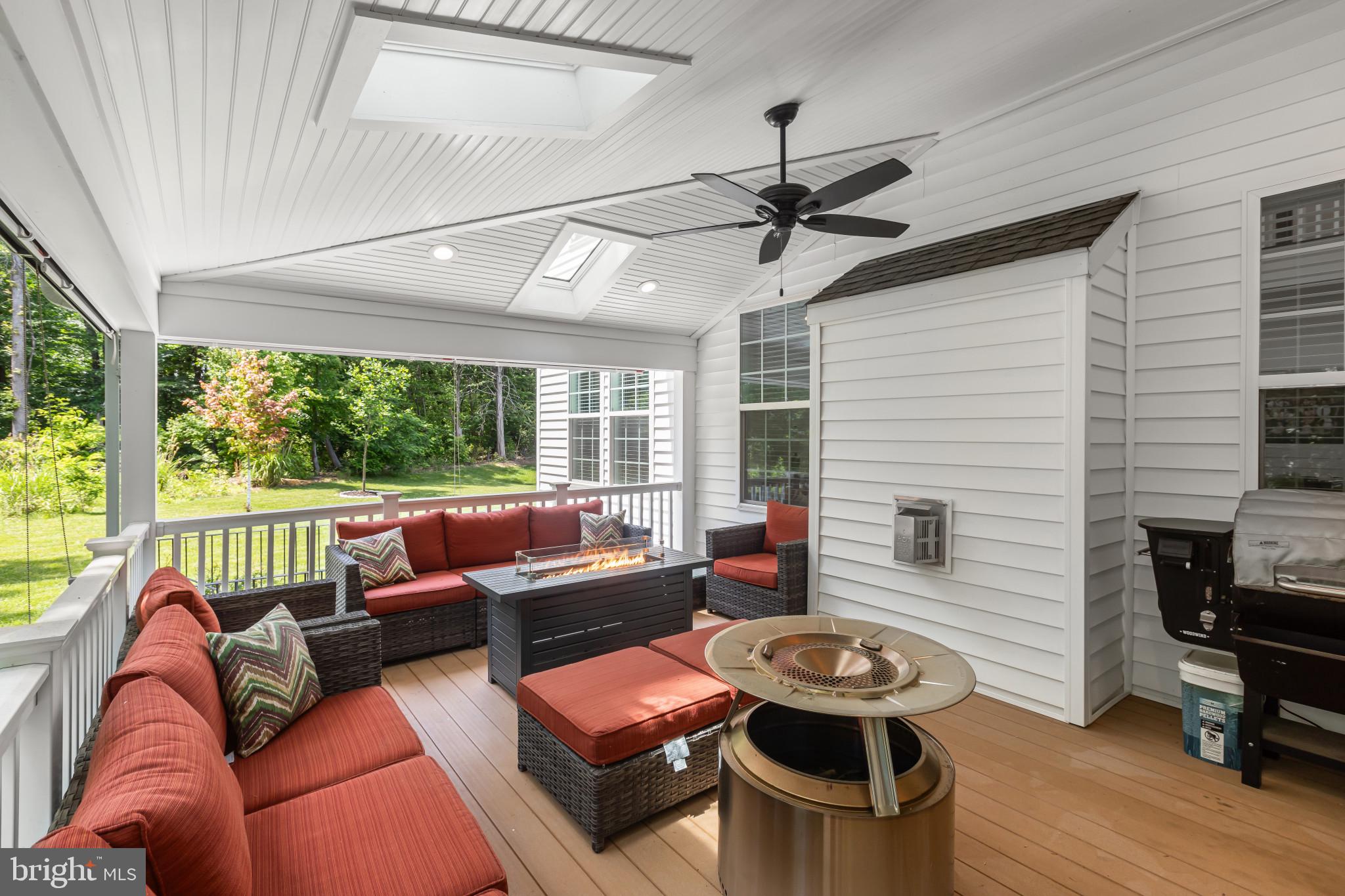 9909 Kildore Way Fort Washington, MD 20744 - Photo 36 of 43 a outdoor living space with furniture and a window