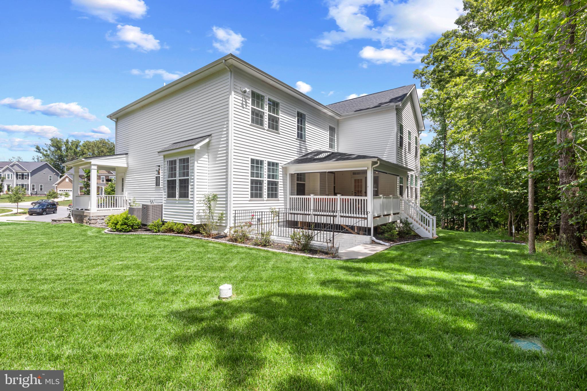 9909 Kildore Way Fort Washington, MD 20744 - Photo 39 of 43 a front view of a house with a yard