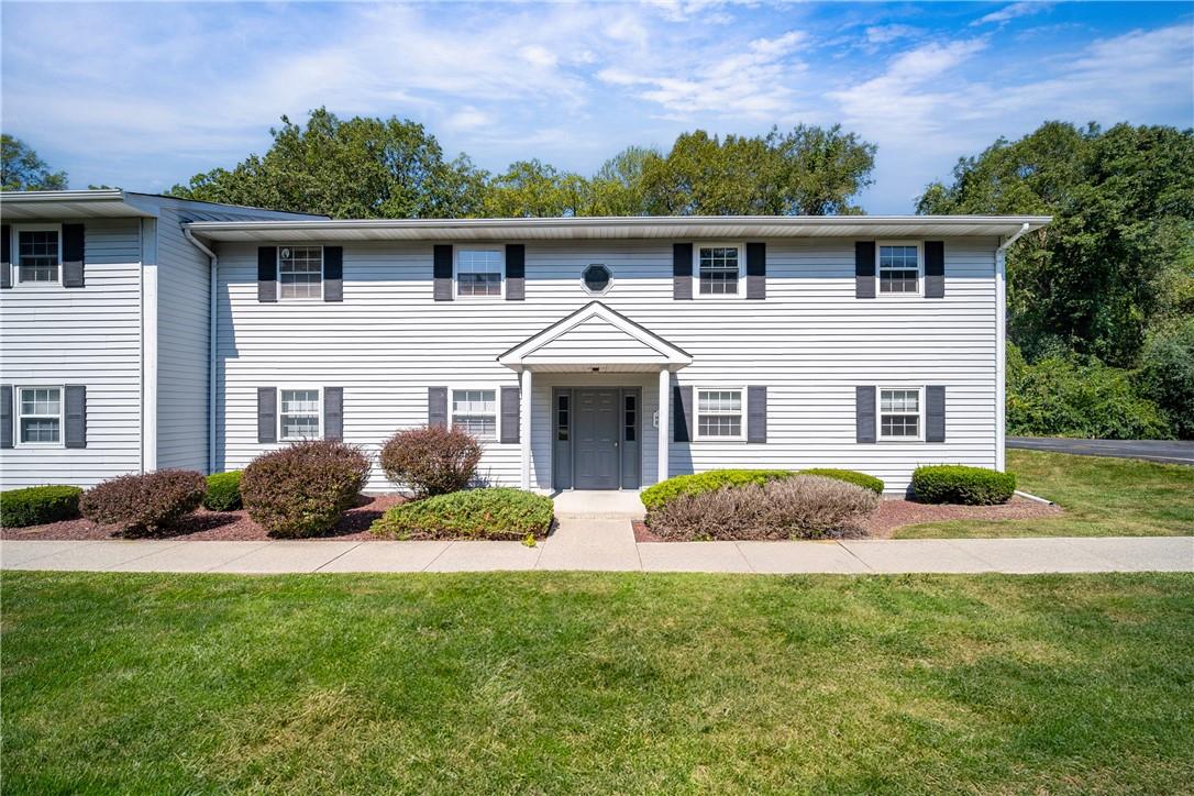 12 Field Court, Unit G Fishkill, NY 12524 - Photo 1 of 1 Colonial house with a front lawn
