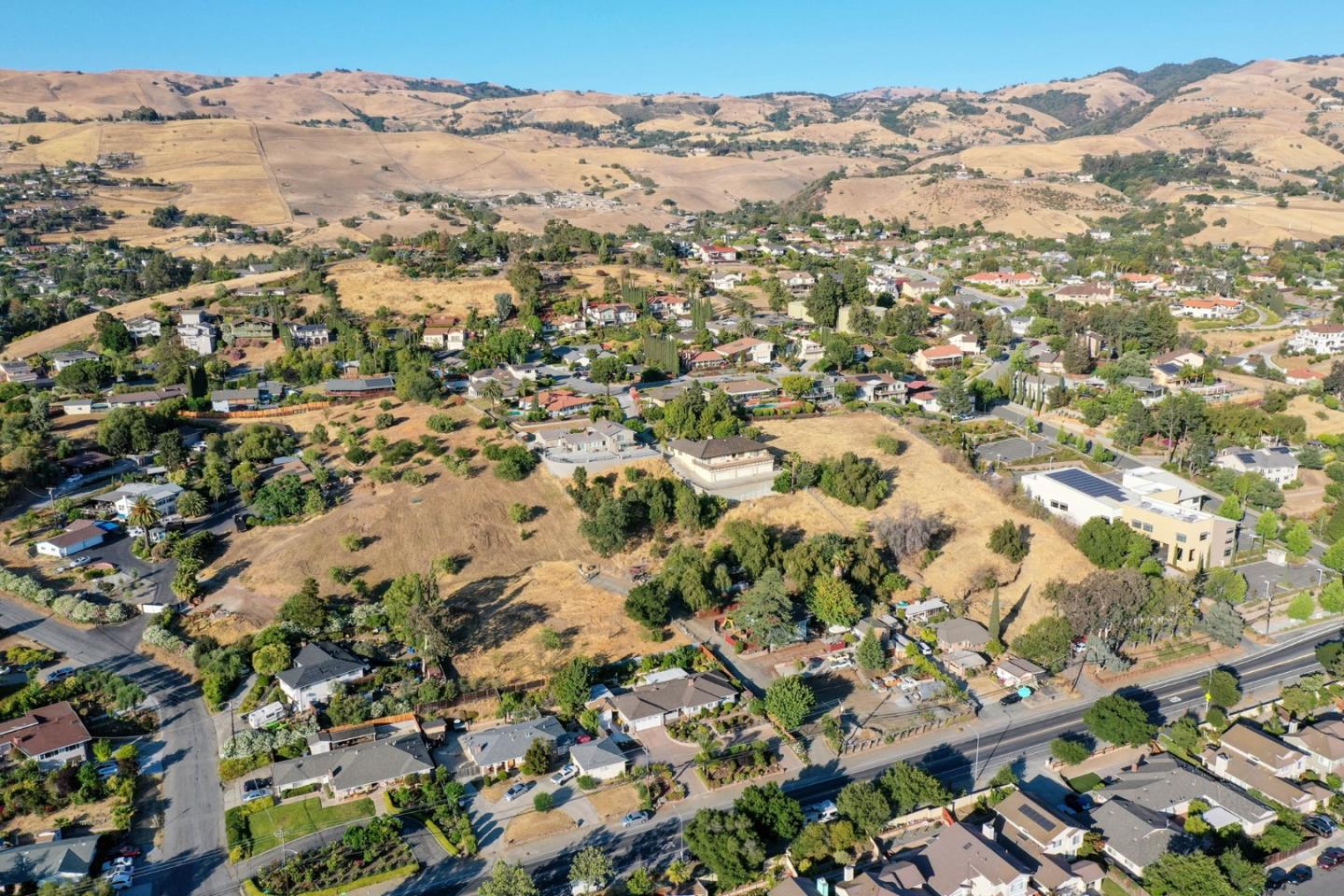 10068 Clayton Road San Jose, CA 95127 - Photo 18 of 34 an aerial view of residential houses with outdoor space