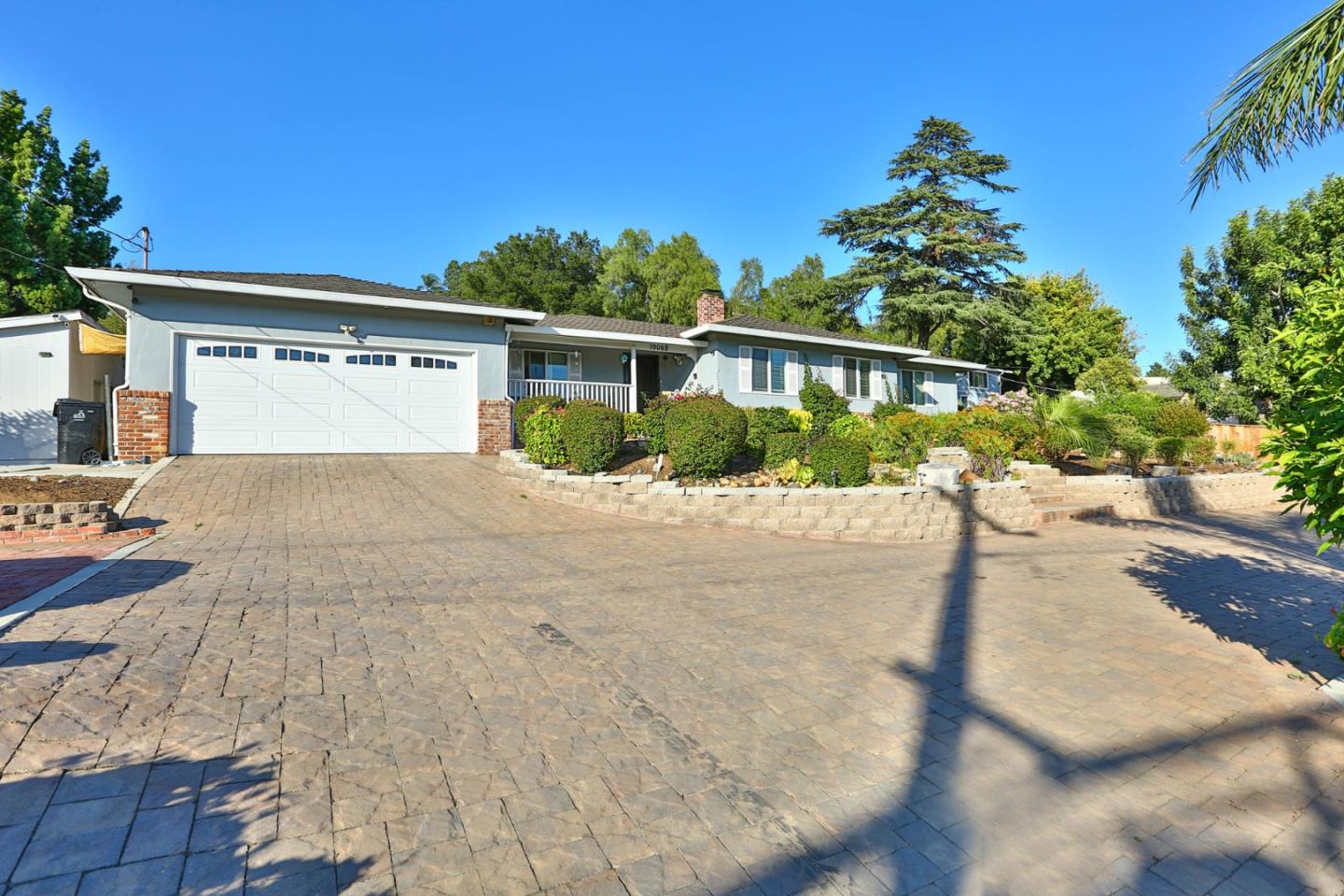 10068 Clayton Road San Jose, CA 95127 - Photo 22 of 34 a front view of a house with a yard and outdoor seating