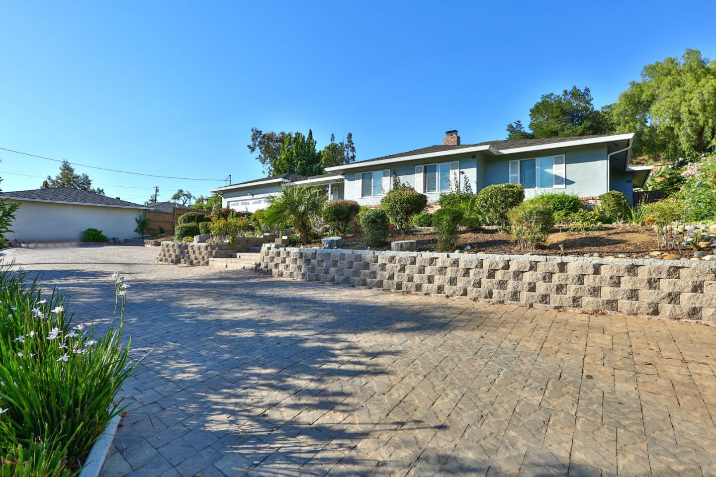 10068 Clayton Road San Jose, CA 95127 - Photo 24 of 34 a front view of a house with a yard