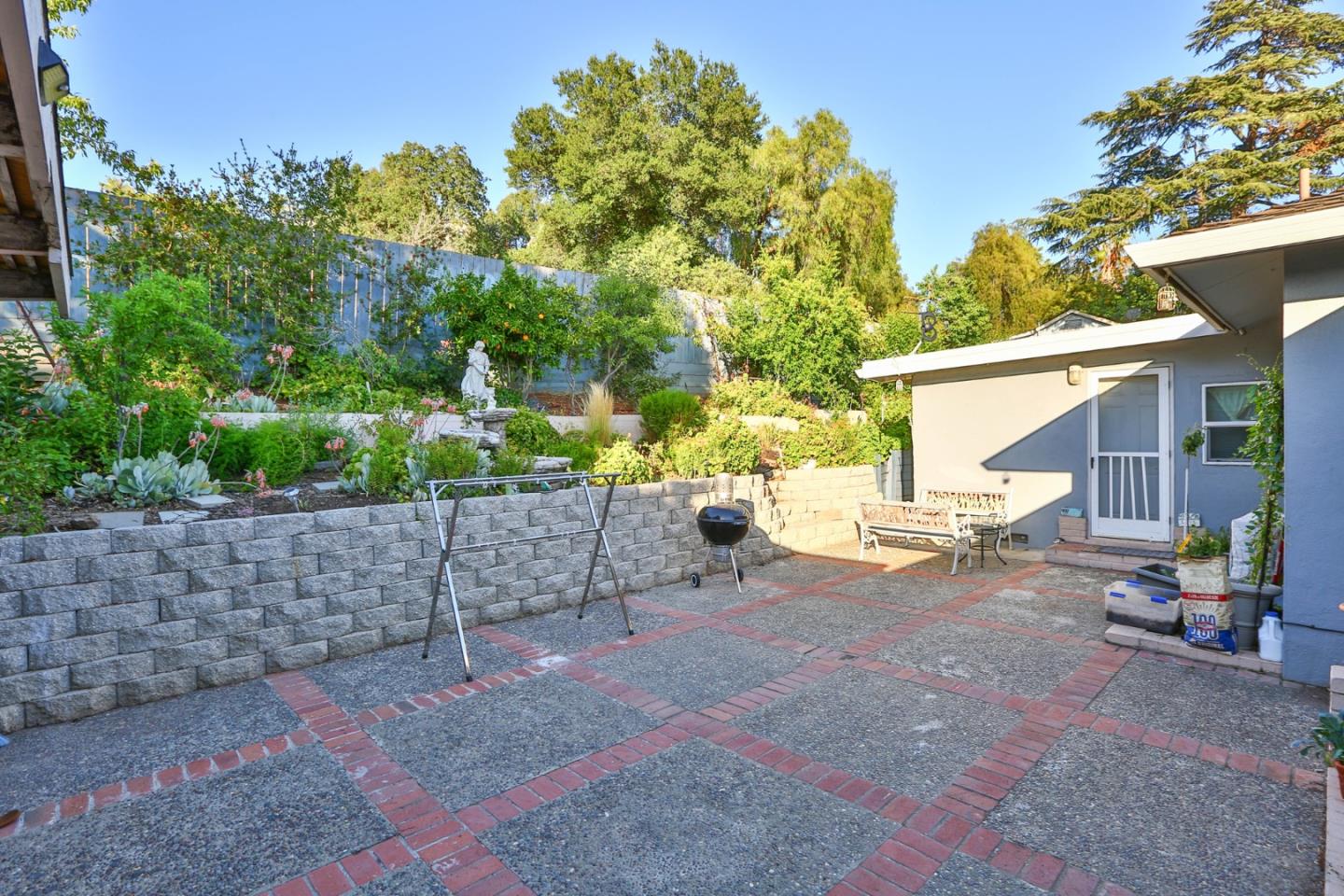 10068 Clayton Road San Jose, CA 95127 - Photo 31 of 34 a view of a outdoor space with furniture and garden