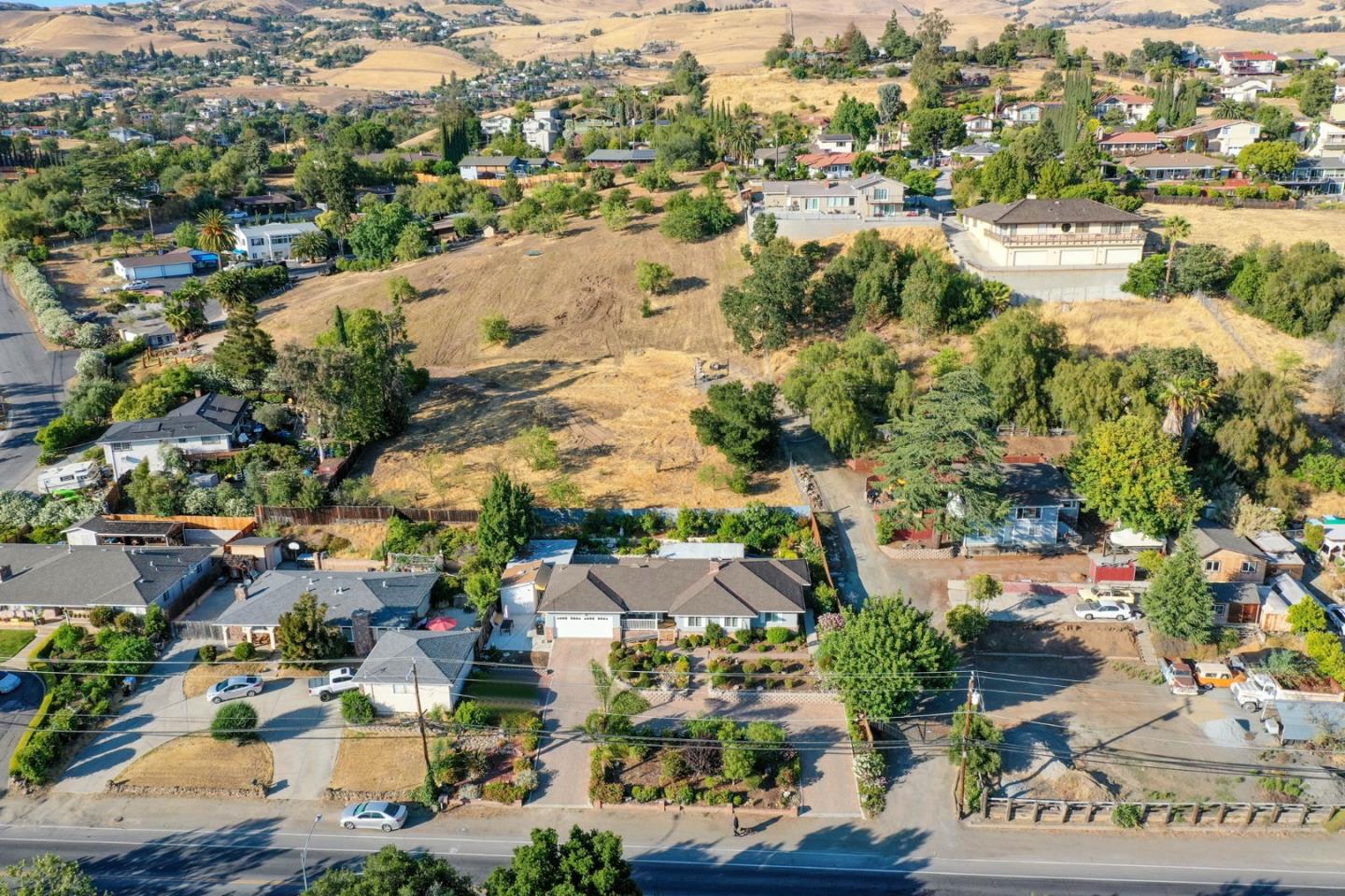 10068 Clayton Road San Jose, CA 95127 - Photo 6 of 34 an aerial view of residential houses with outdoor space