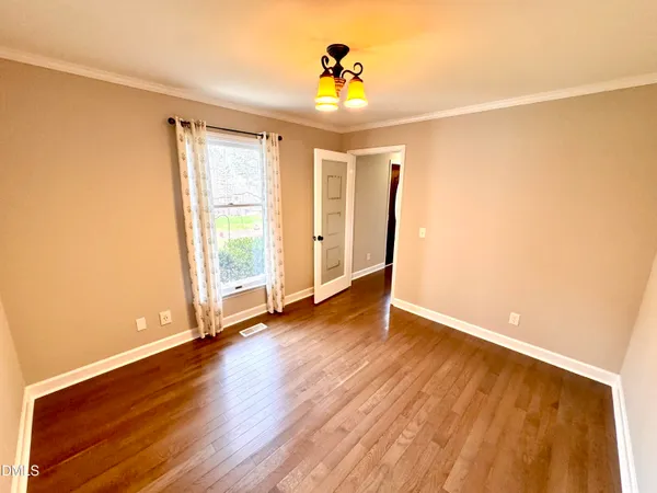 a bathroom with a sink toilet and a mirror