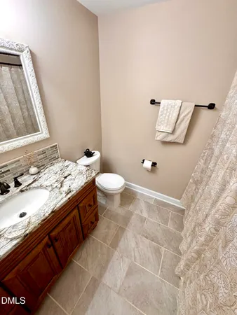 a view of a house with large windows