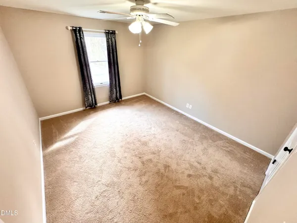 a view of outdoor space and front view of a house