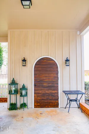 a view of workspace with wooden floor and ceiling fan
