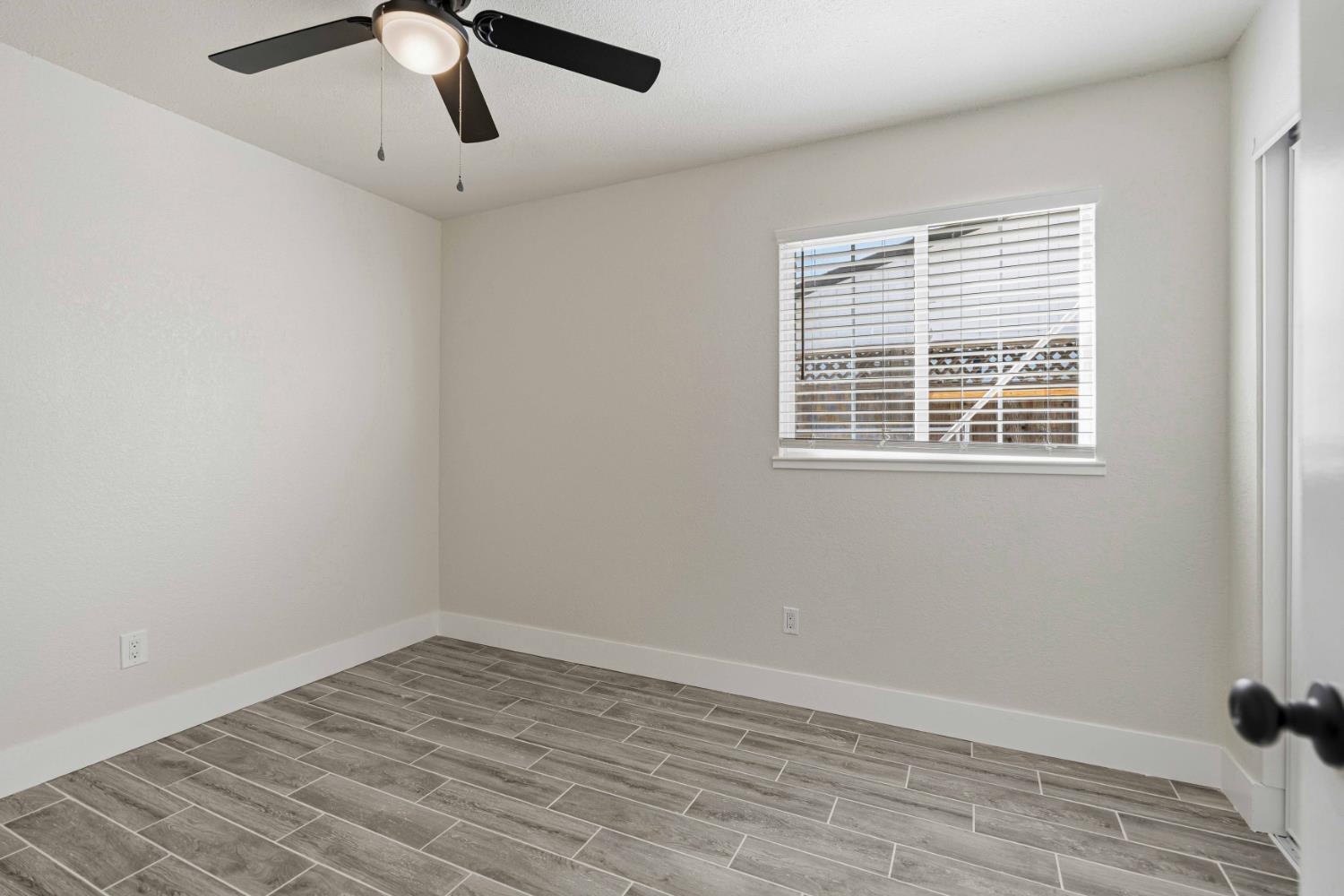 1464 Denise Drive Ripon, CA 95366 - Photo 22 of 41 an empty room with a window