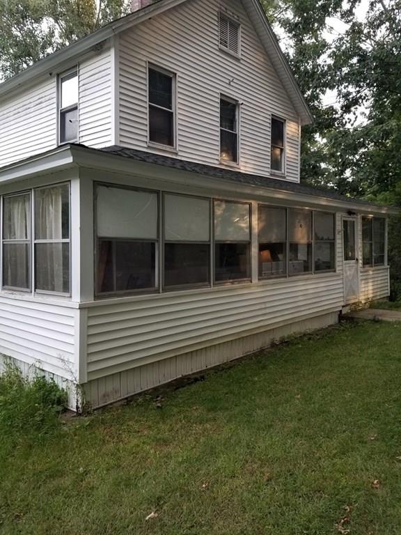 a front view of a house with a balcony