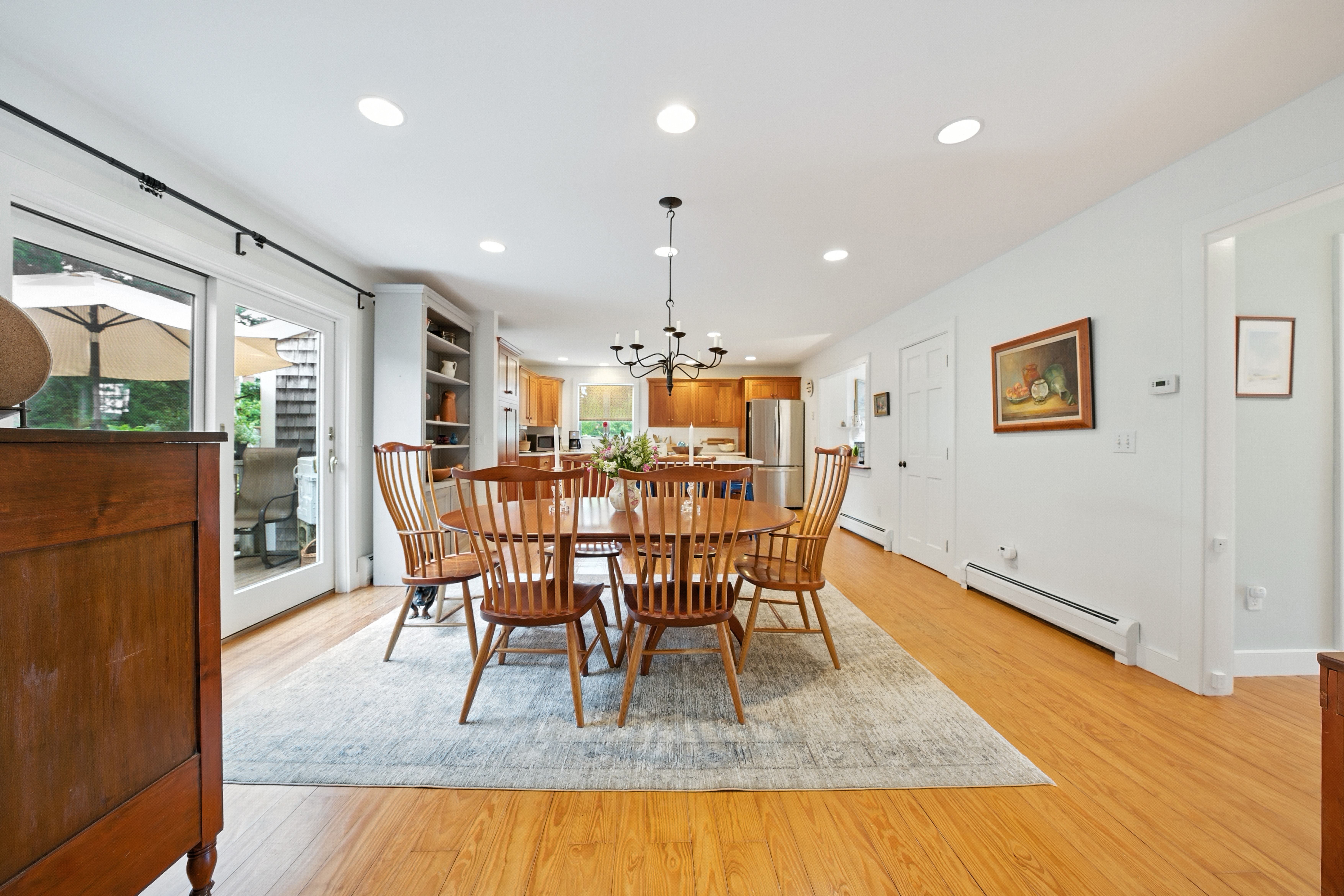 1 Halyard Lane Nantucket, MA 02554 - Photo 24 of 59 a view of a dining room with furniture window and wooden floor