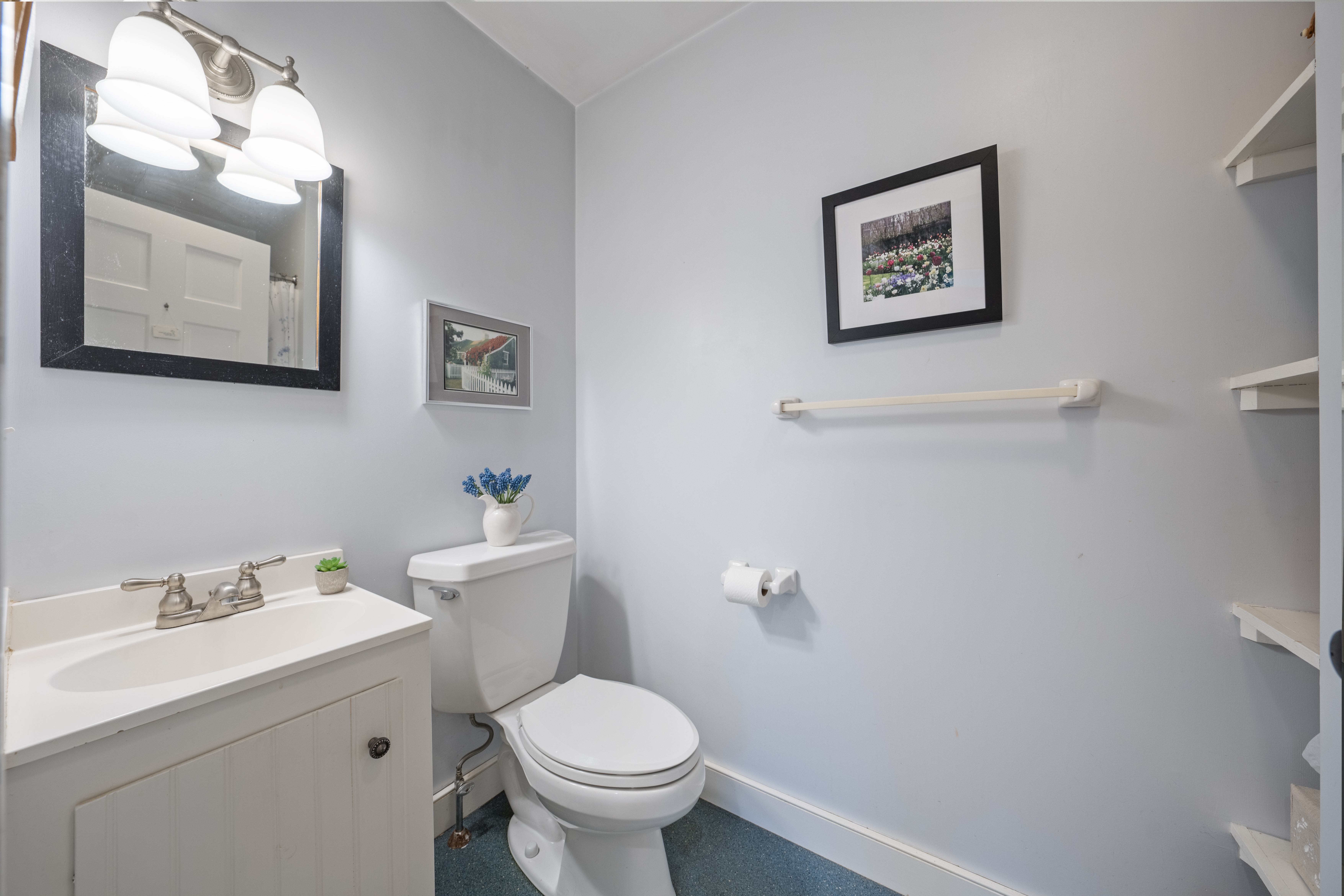 1 Halyard Lane Nantucket, MA 02554 - Photo 35 of 59 a bathroom with a toilet sink and mirror