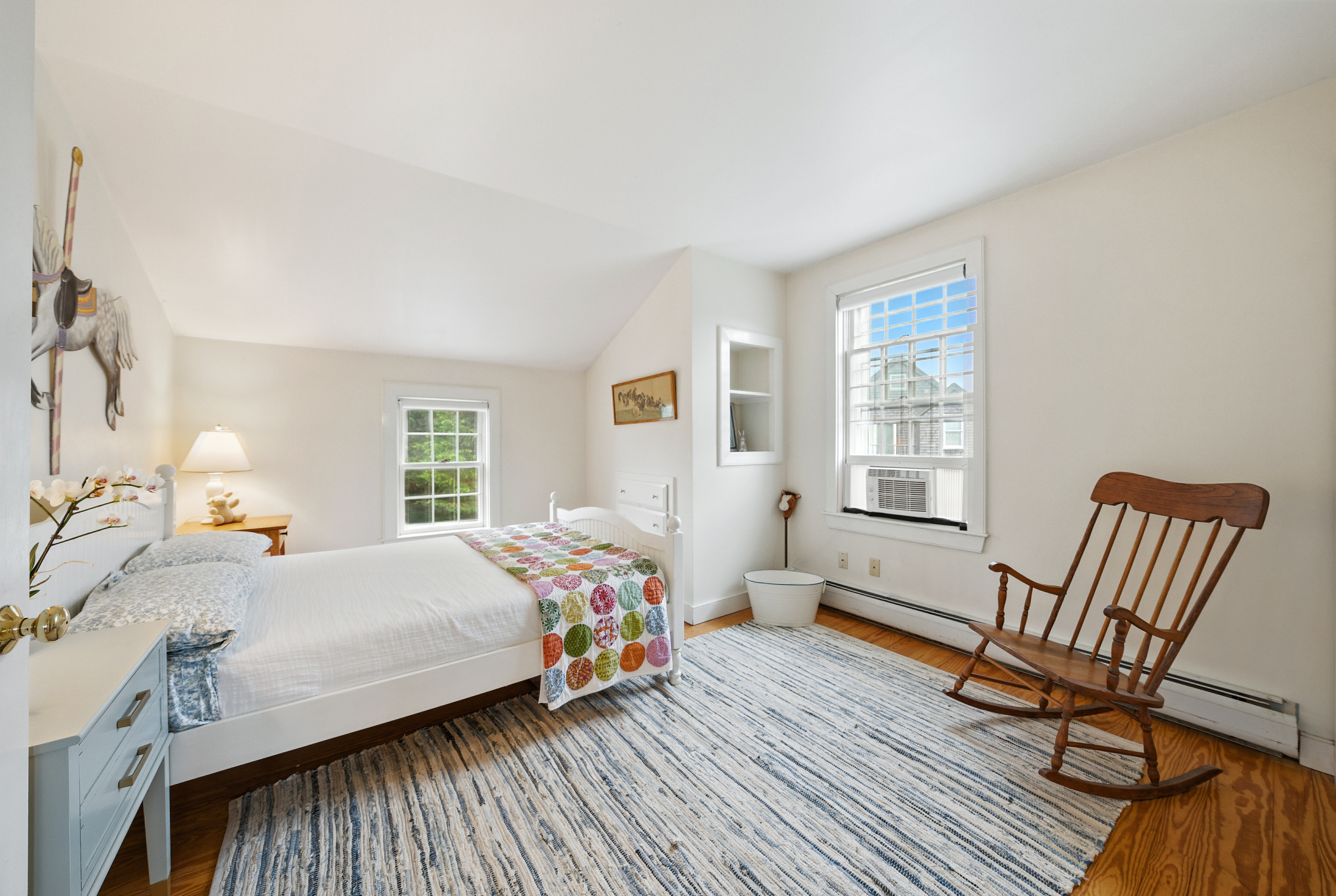 1 Halyard Lane Nantucket, MA 02554 - Photo 40 of 59 a bedroom with a bed and wooden floor