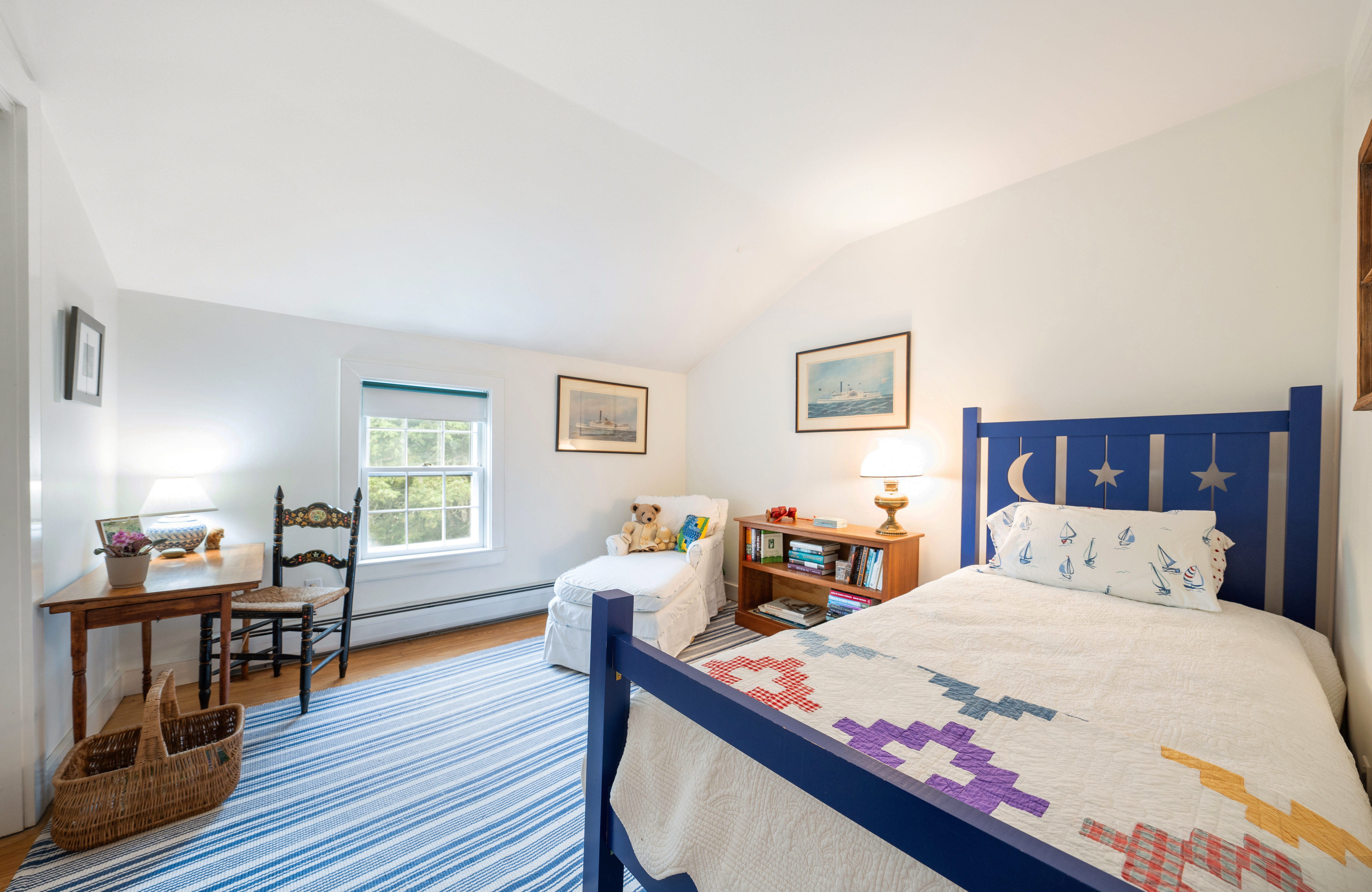 1 Halyard Lane Nantucket, MA 02554 - Photo 42 of 59 a bedroom with a bed and wooden floor