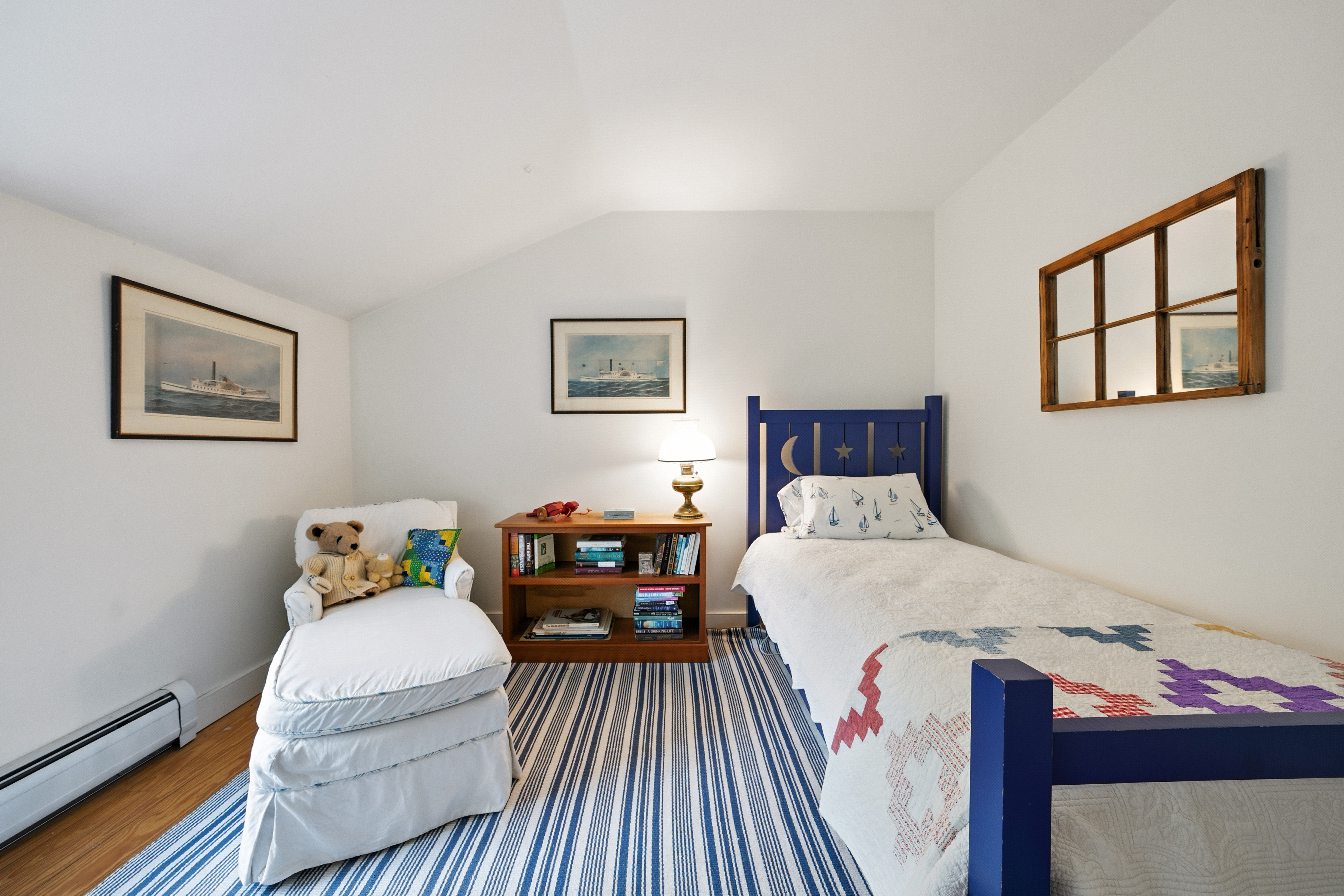 1 Halyard Lane Nantucket, MA 02554 - Photo 43 of 59 a bedroom with a bed and wooden floor
