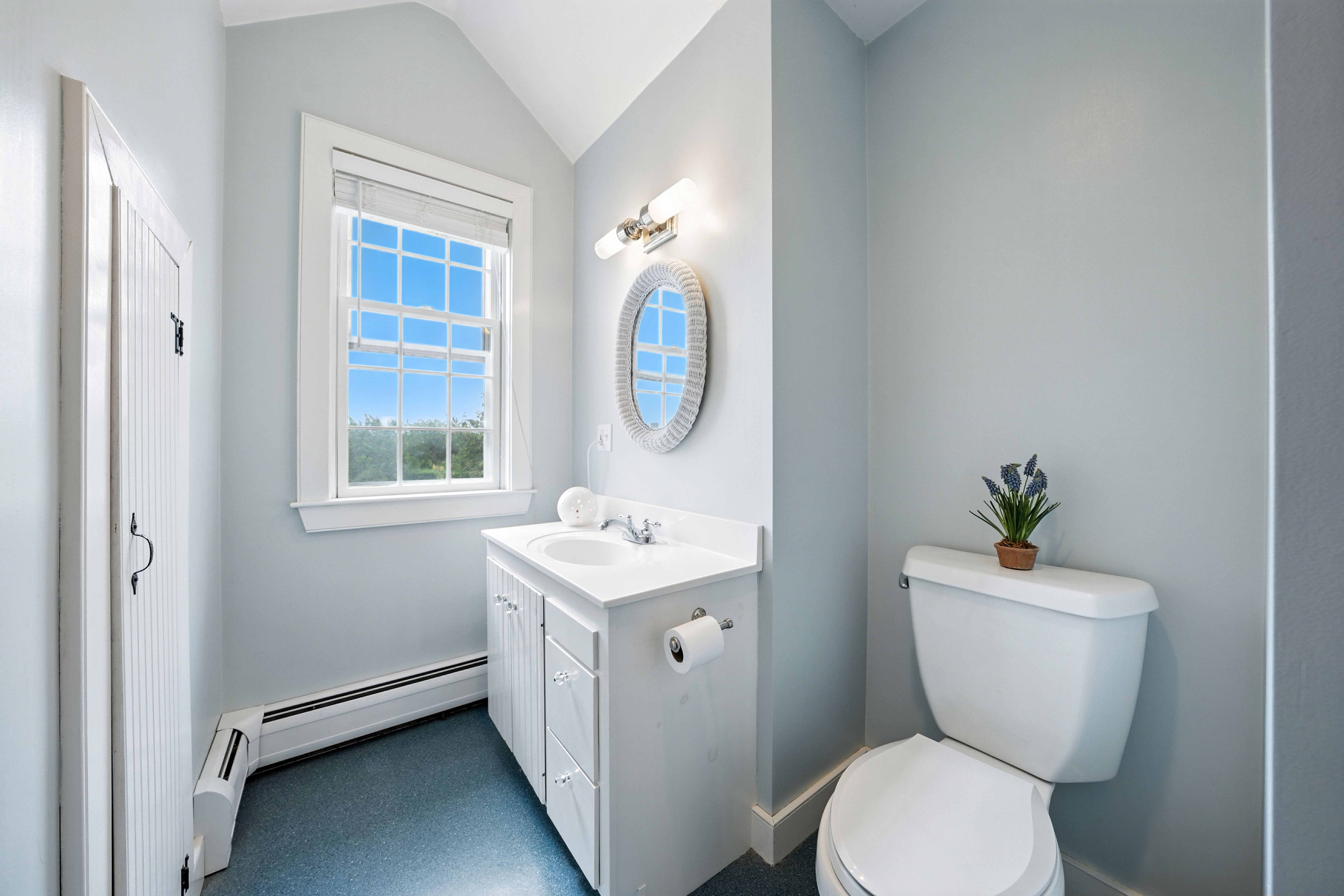 1 Halyard Lane Nantucket, MA 02554 - Photo 44 of 59 a bathroom with a toilet a sink and a window