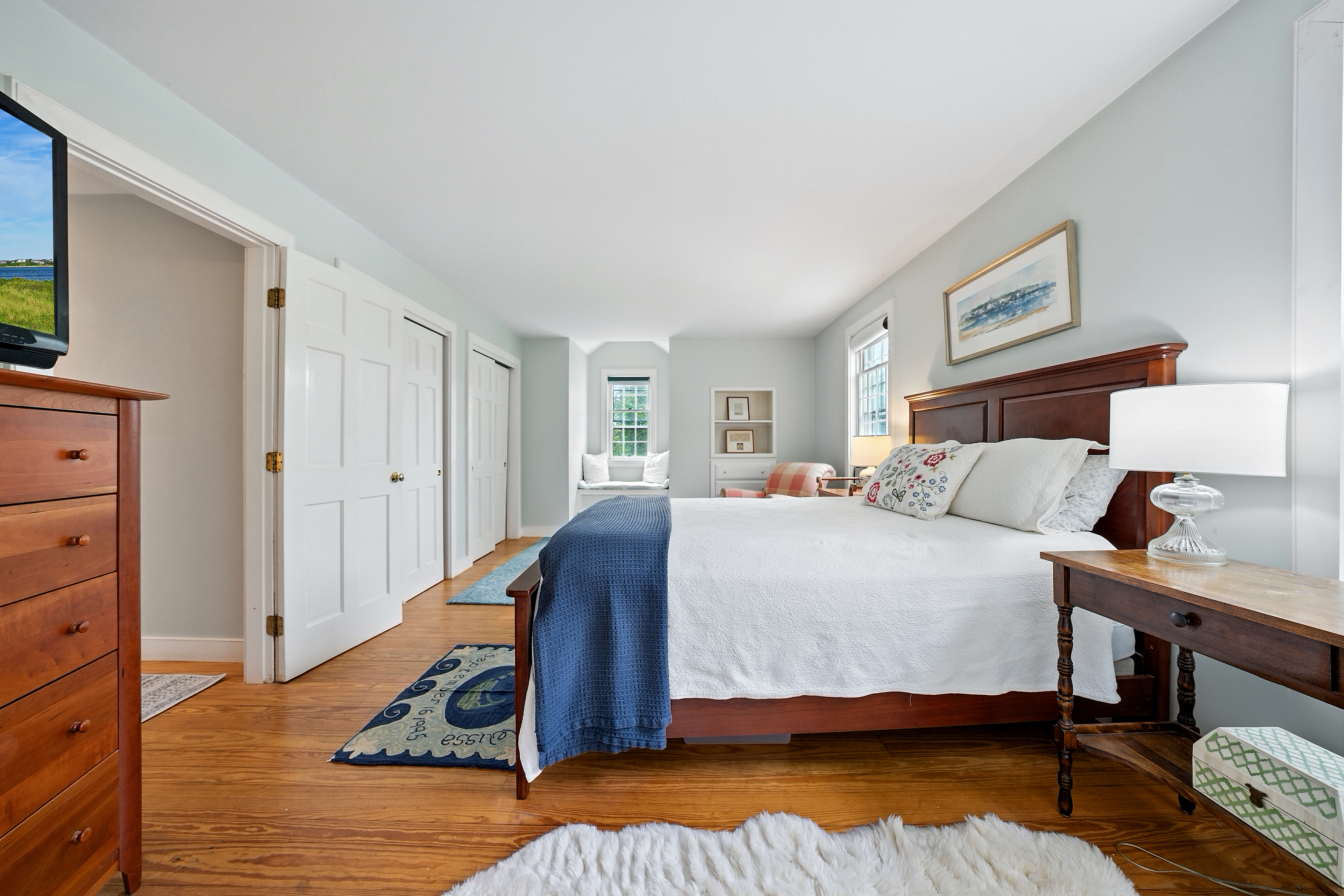 1 Halyard Lane Nantucket, MA 02554 - Photo 48 of 59 a bedroom with a bed and a night stand