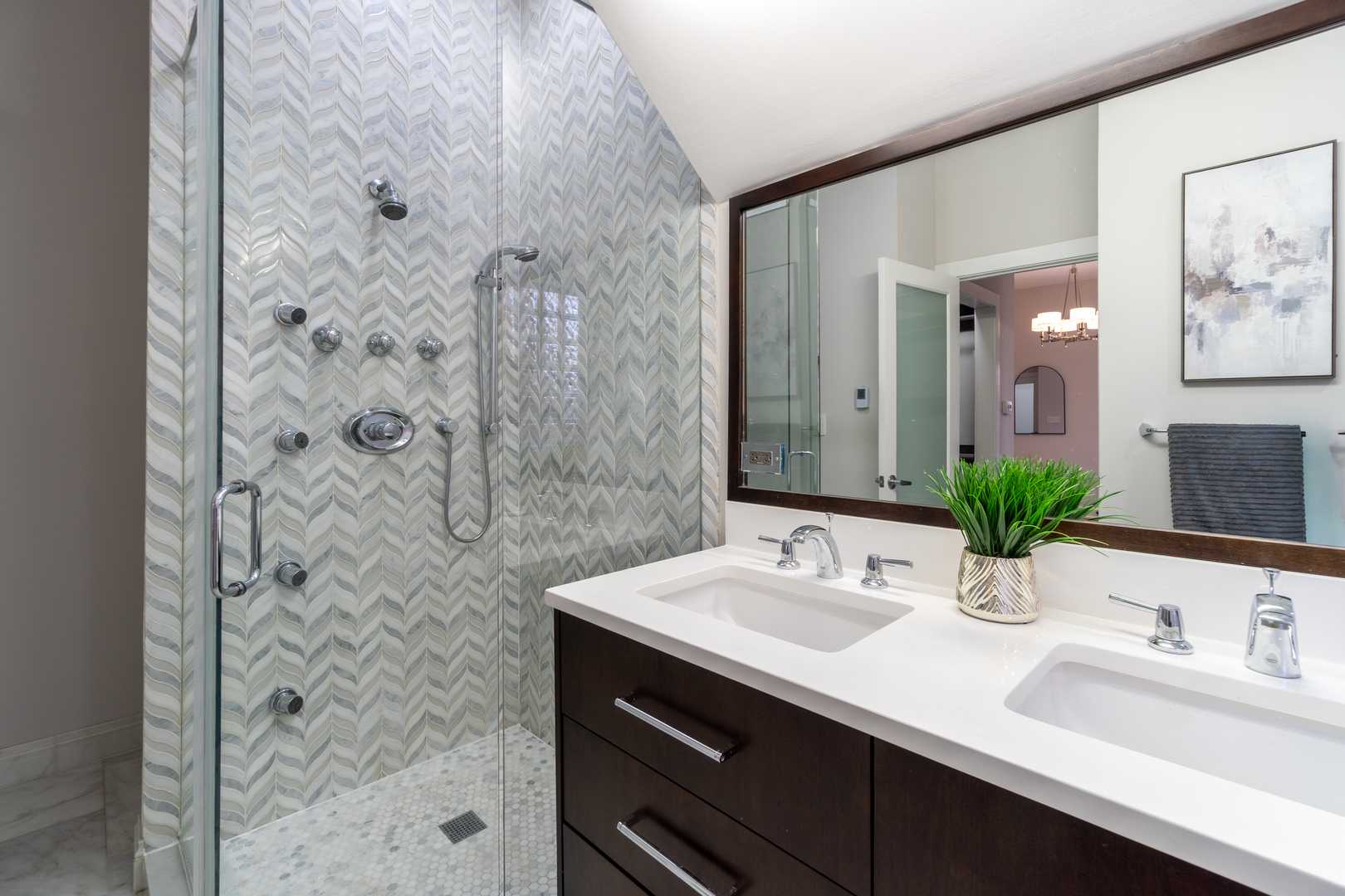 908 North Winchester Avenue Chicago, IL 60622 - Photo 14 of 46 a bathroom with a sink a mirror and a shower