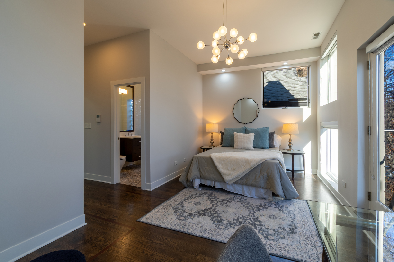 908 North Winchester Avenue Chicago, IL 60622 - Photo 16 of 46 a bedroom with a bed and wooden floor