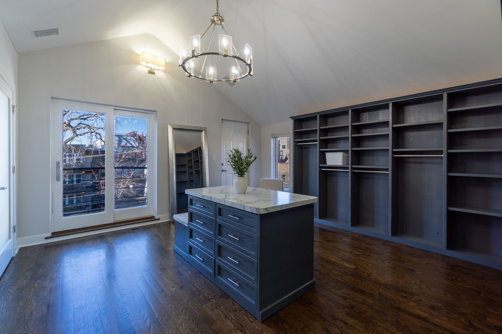908 North Winchester Avenue Chicago, IL 60622 - Photo 27 of 46 a living room with hard wood floors and a kitchen