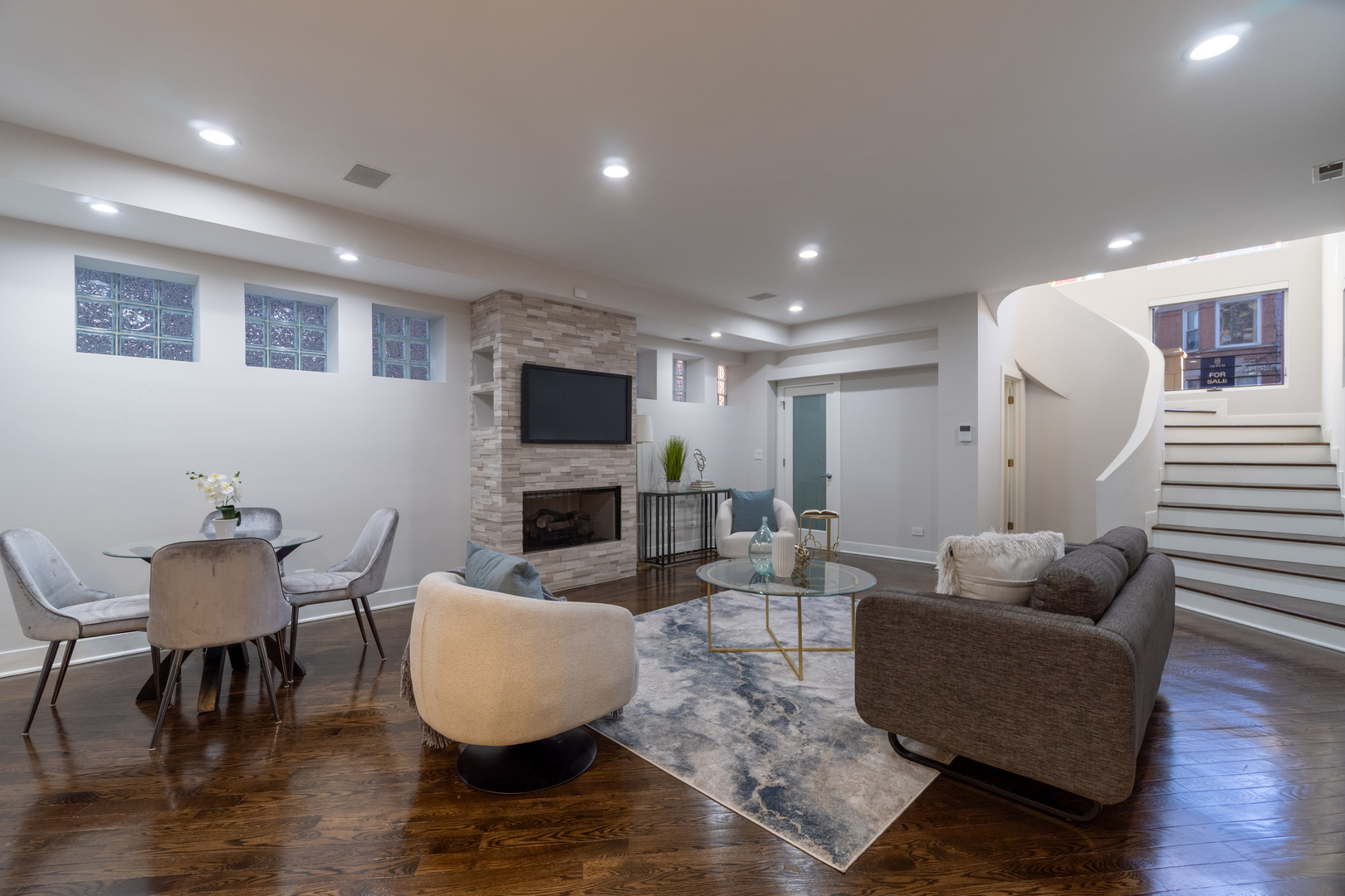 908 North Winchester Avenue Chicago, IL 60622 - Photo 30 of 46 a living room with furniture and a flat screen tv