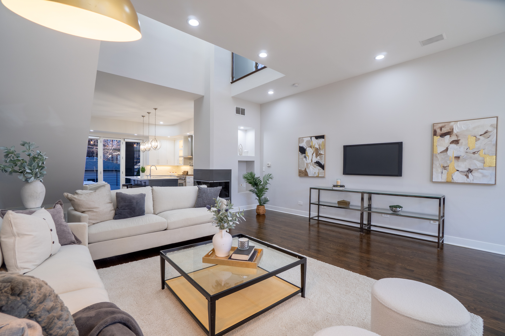 908 North Winchester Avenue Chicago, IL 60622 - Photo 3 of 46 a living room with furniture and a flat screen tv