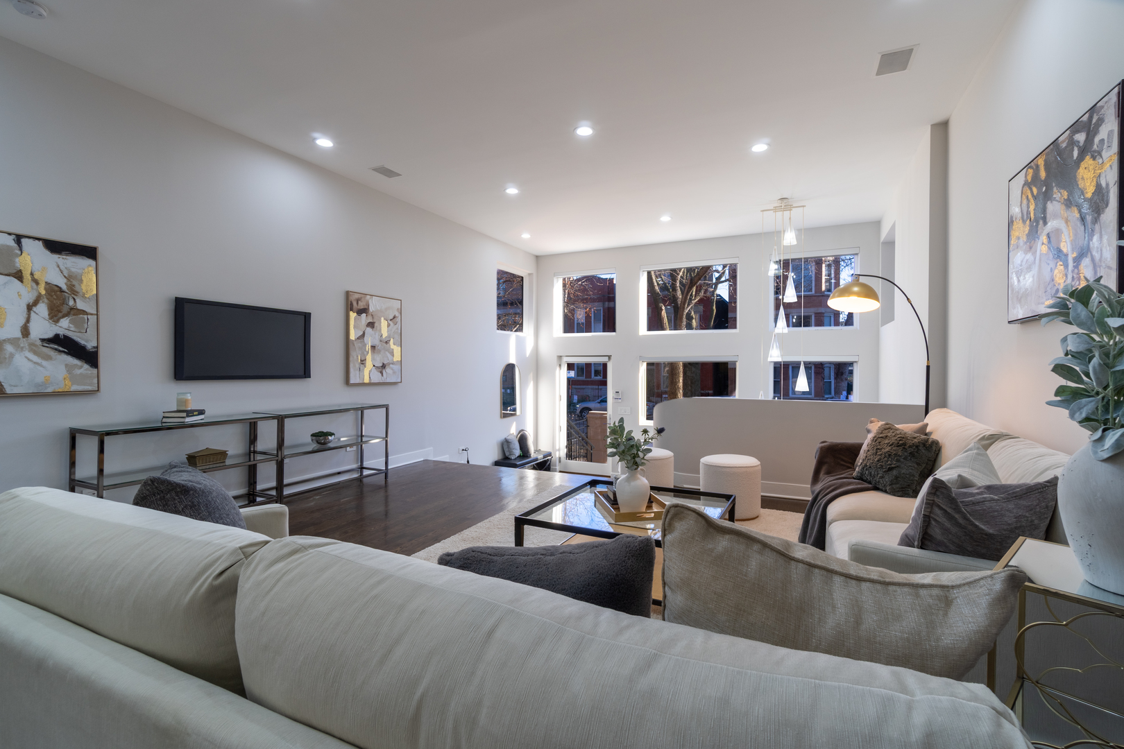 908 North Winchester Avenue Chicago, IL 60622 - Photo 4 of 46 a living room with furniture and a flat screen tv