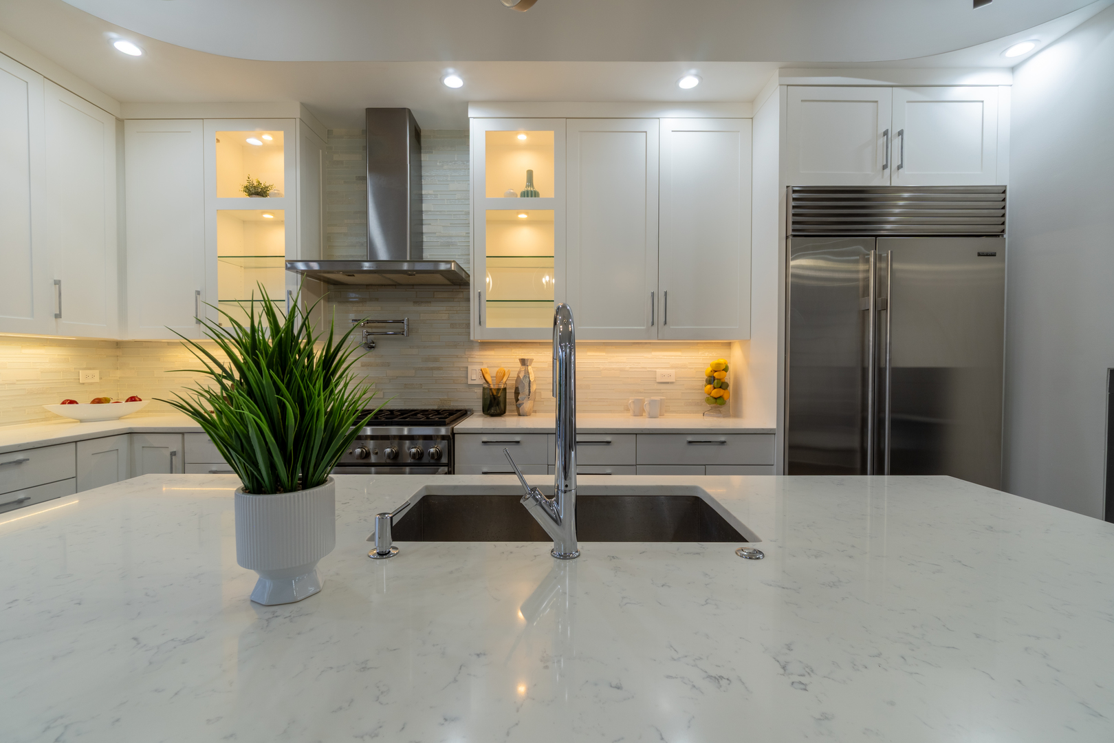 908 North Winchester Avenue Chicago, IL 60622 - Photo 10 of 46 a kitchen with a refrigerator and a sink