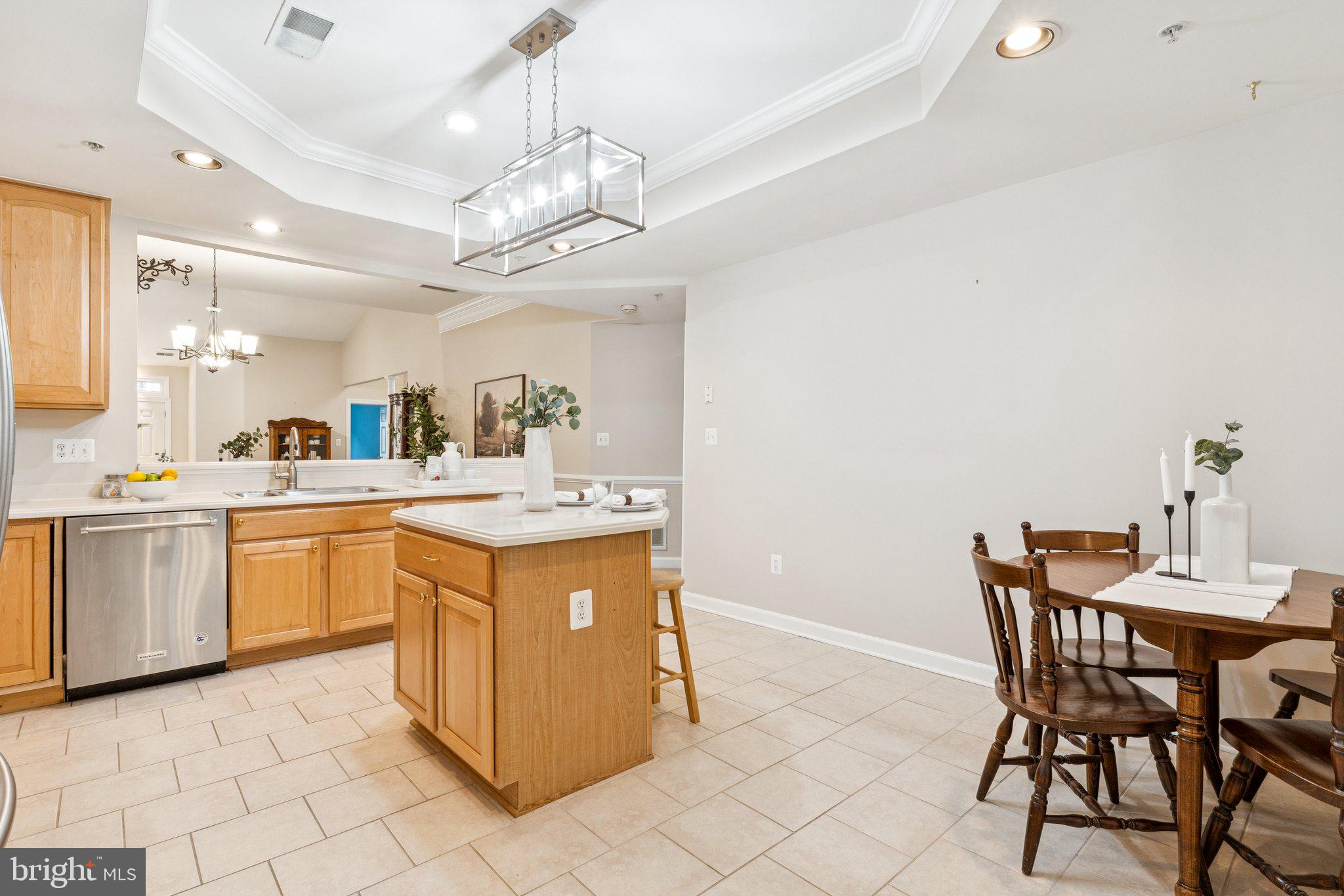 381 Colony Point Place Edgewater, MD 21037 - Photo 15 of 37 a kitchen with a sink and cabinets