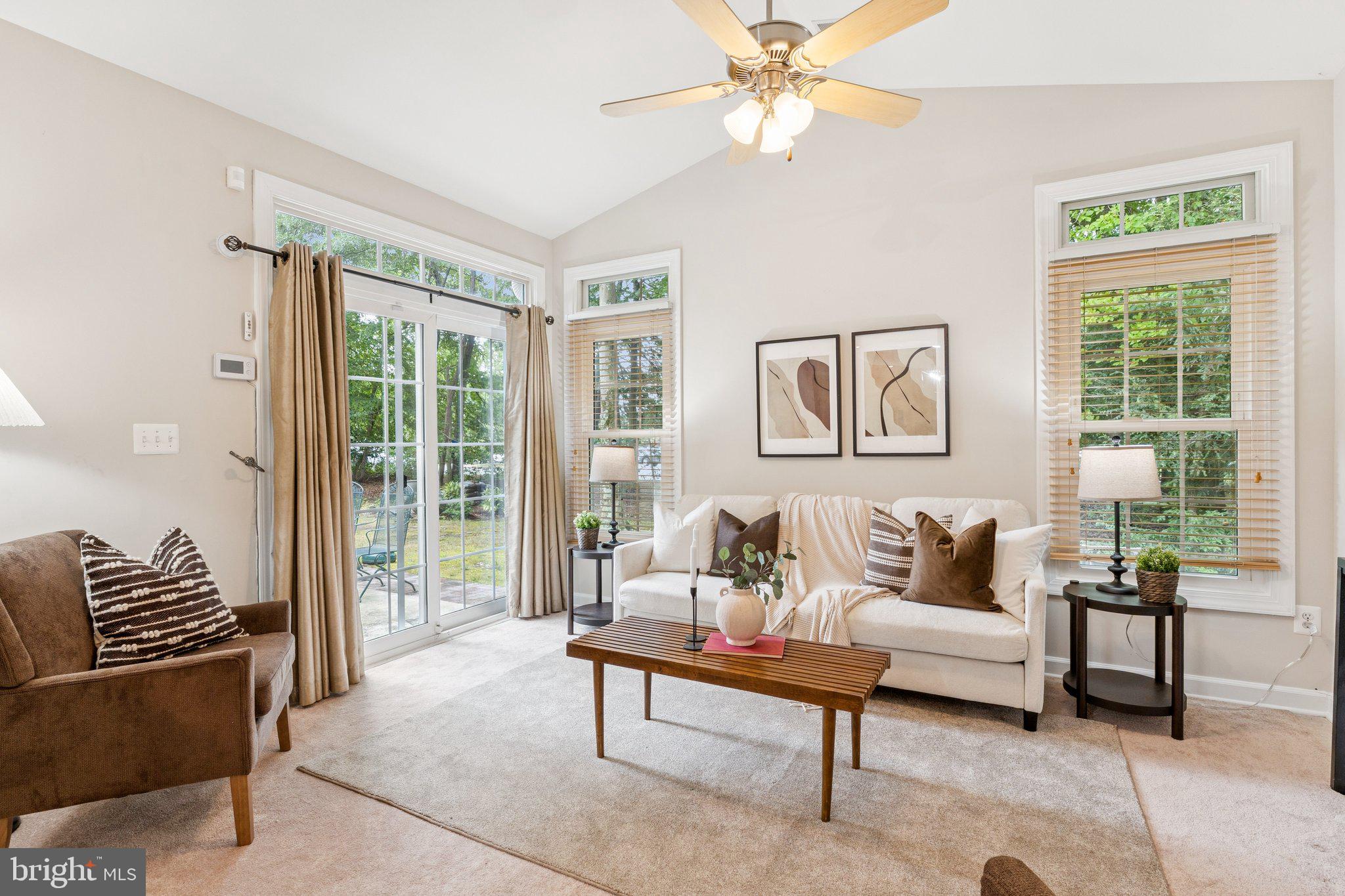 381 Colony Point Place Edgewater, MD 21037 - Photo 16 of 37 a living room with furniture and a large window