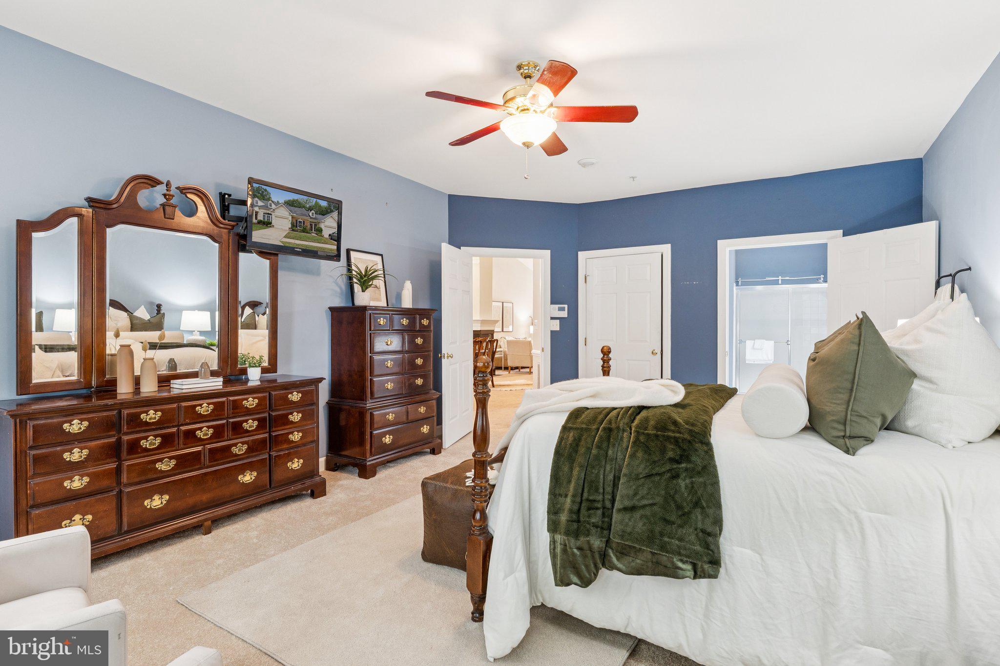 381 Colony Point Place Edgewater, MD 21037 - Photo 22 of 37 a bed room with a bed and a television