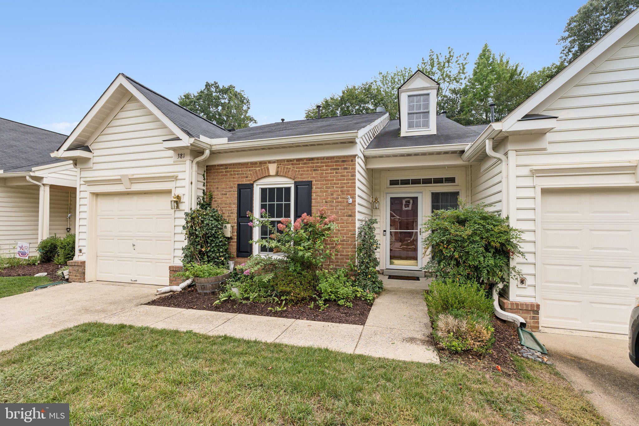 381 Colony Point Place Edgewater, MD 21037 - Photo 29 of 37 front view of house with a yard