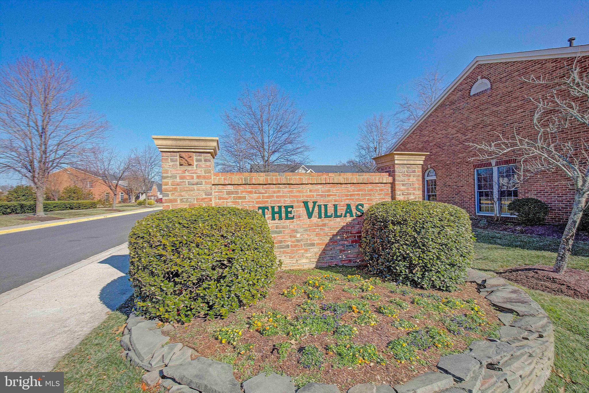 381 Colony Point Place Edgewater, MD 21037 - Photo 36 of 37 a front view of a house with a yard