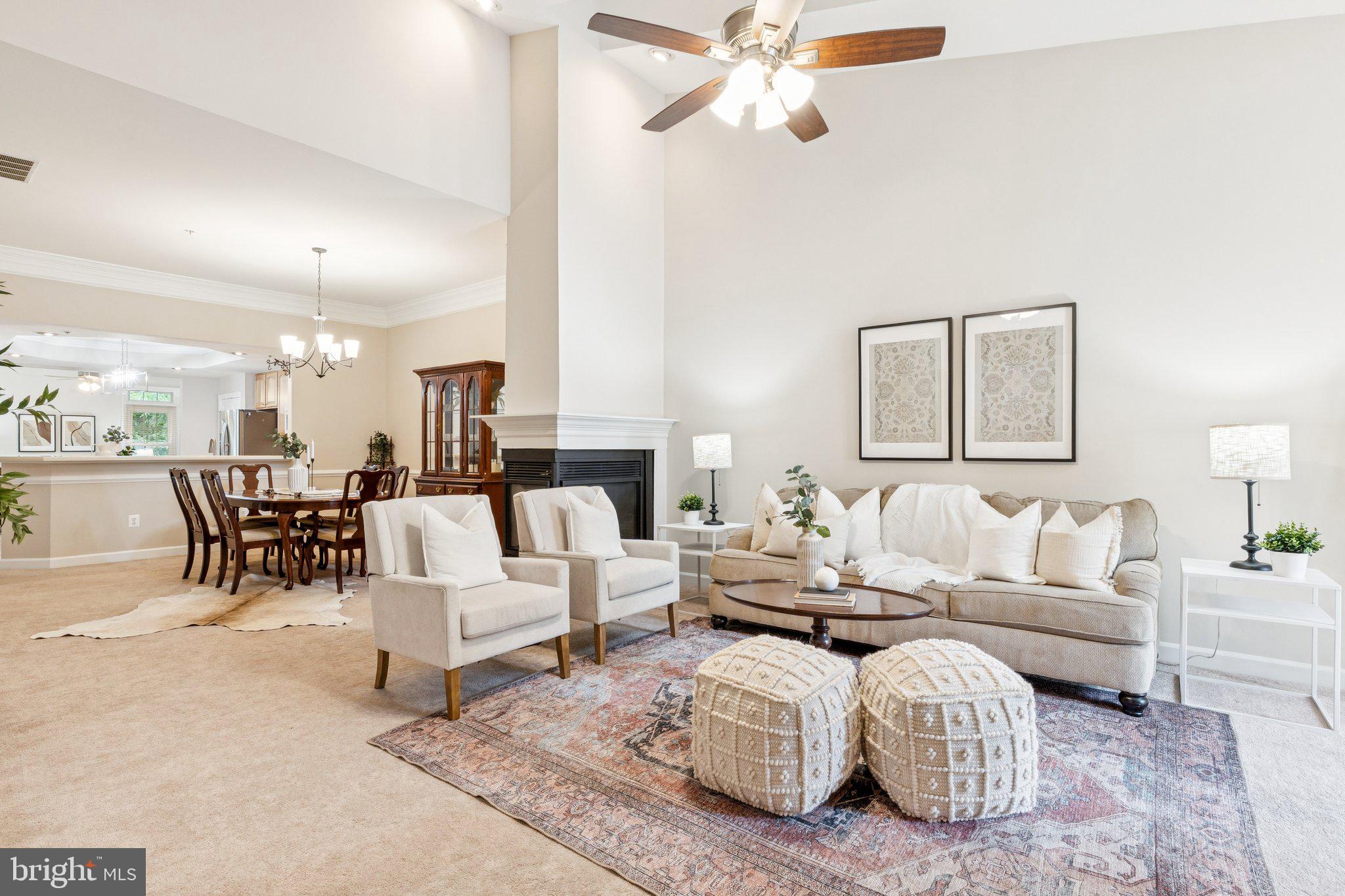 381 Colony Point Place Edgewater, MD 21037 - Photo 7 of 37 a living room with furniture and a large mirror