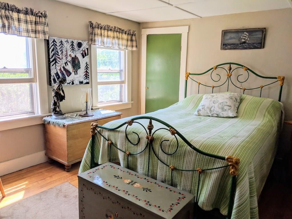 41 Liberty Road Washington, ME 04574 - Photo 9 of 19 Light filled upstairs bedroom