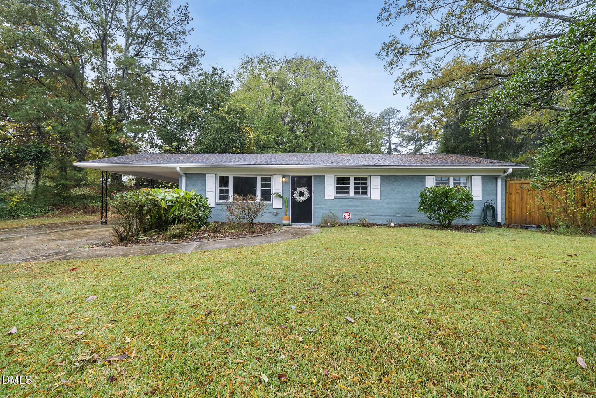 1002 Bacon Street Durham, NC 27701 - Photo 1 of 25 a front view of a house with a yard