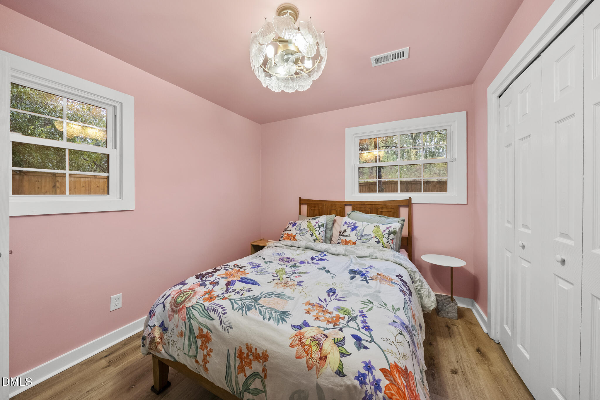 1002 Bacon Street Durham, NC 27701 - Photo 13 of 25 a bedroom with a bed and a window