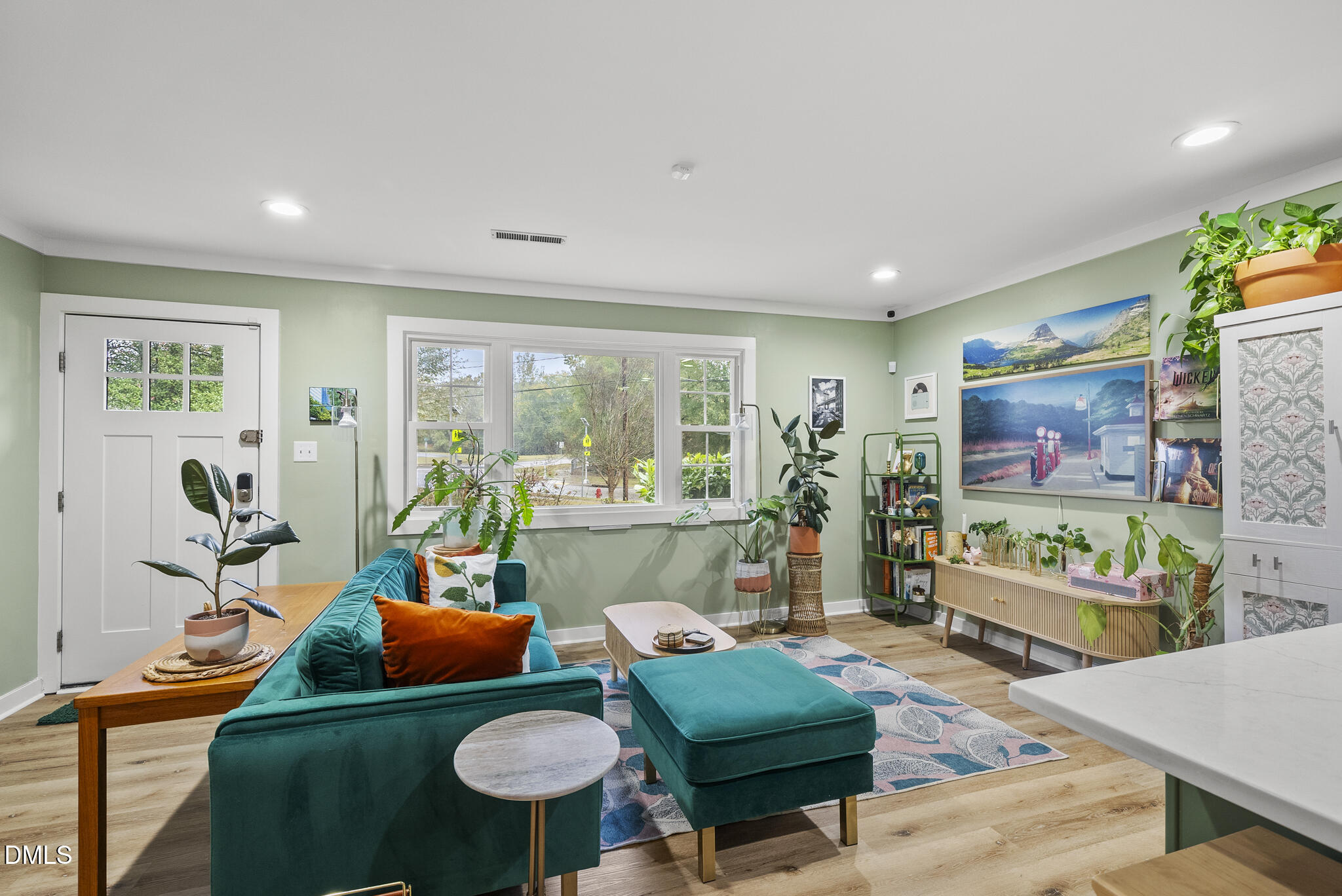 1002 Bacon Street Durham, NC 27701 - Photo 5 of 25 a living room with furniture and a flat screen tv