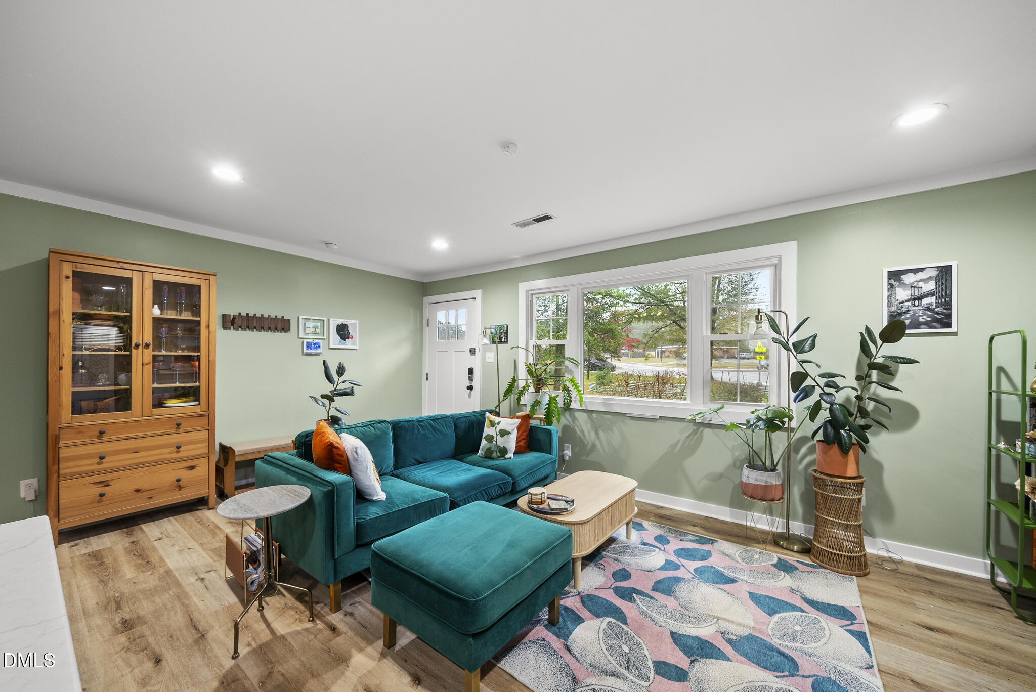 1002 Bacon Street Durham, NC 27701 - Photo 6 of 25 a living room with furniture and a window