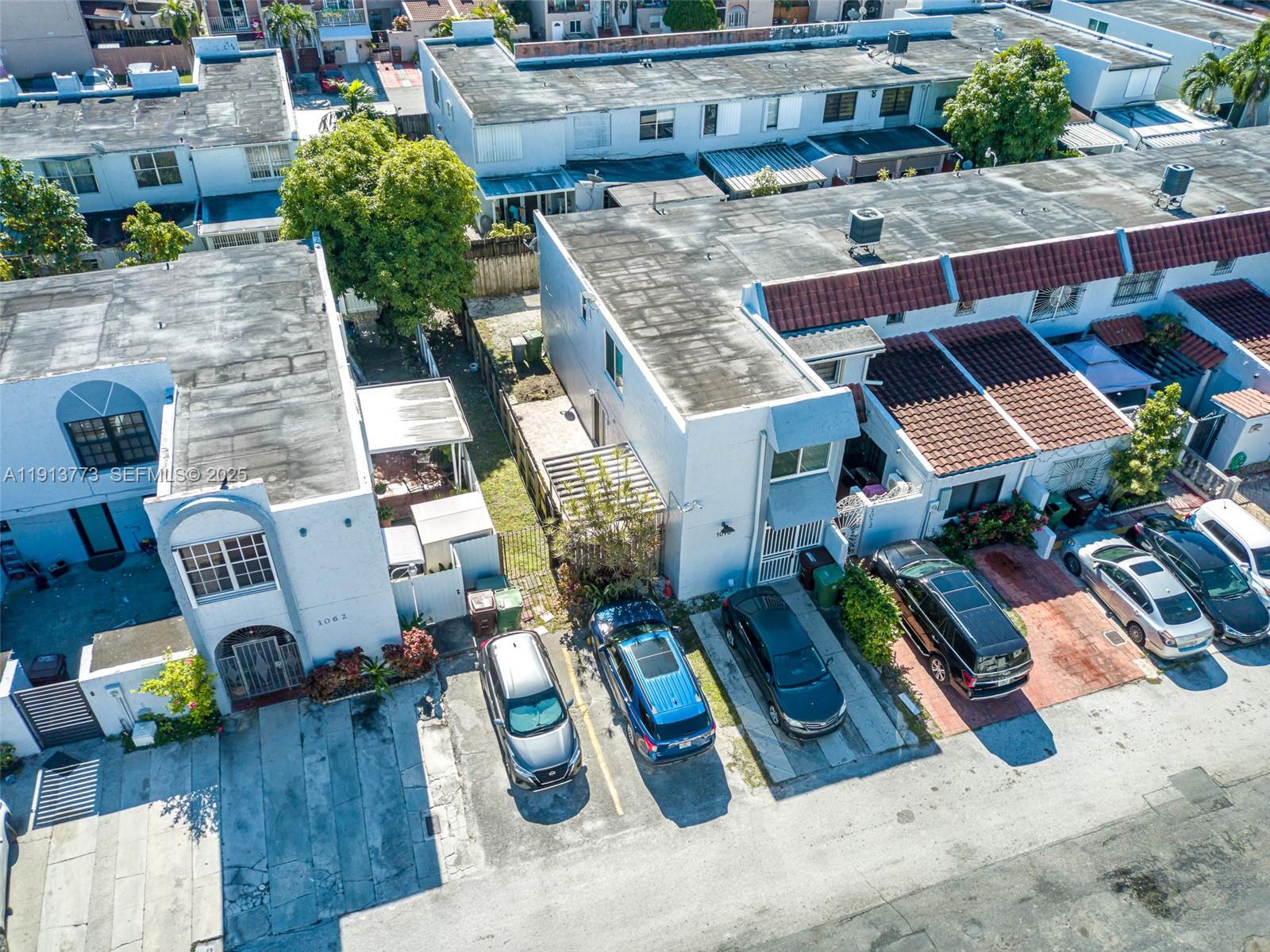 1070 West 43rd Place, Unit 38 Hialeah, FL 33012 - Photo 24 of 25 an aerial view of a house with outdoor space