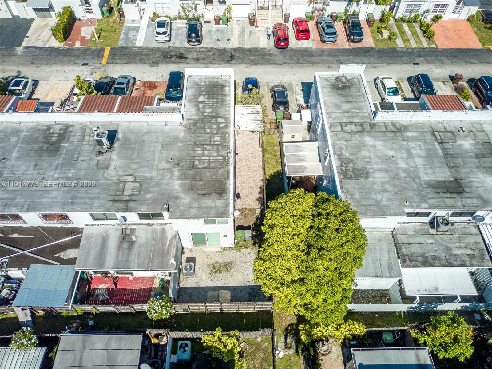 1070 West 43rd Place, Unit 38 Hialeah, FL 33012 - Photo 25 of 25 an outdoor space with outdoor seating