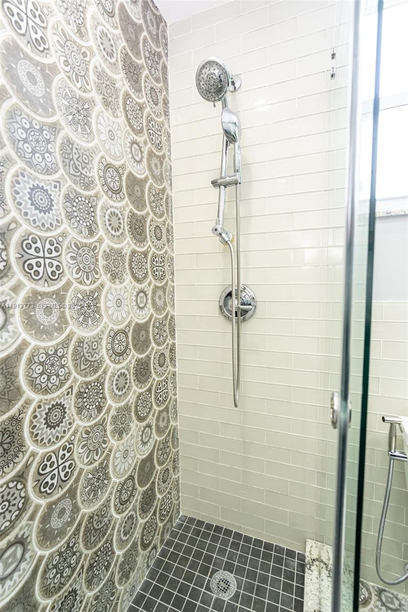 1070 West 43rd Place, Unit 38 Hialeah, FL 33012 - Photo 6 of 25 a bathroom with a shower